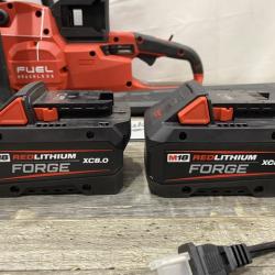 AS-IS Milwaukee FUEL 18V Brushless Cordless 20 in. Dual Battery Chainsaw Kit