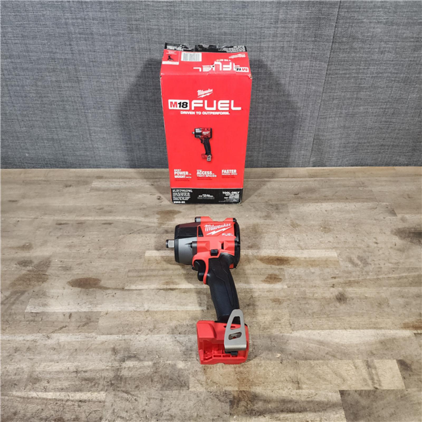 HOUSTON LOCATION - AS-IS (APPEARS LIKE NEW) Milwaukee 2962-20 M18 18V Fuel 1/2 Mid-Torque Impact Wrench Cordless Lithium-Ion Brushless (Tool-Only)