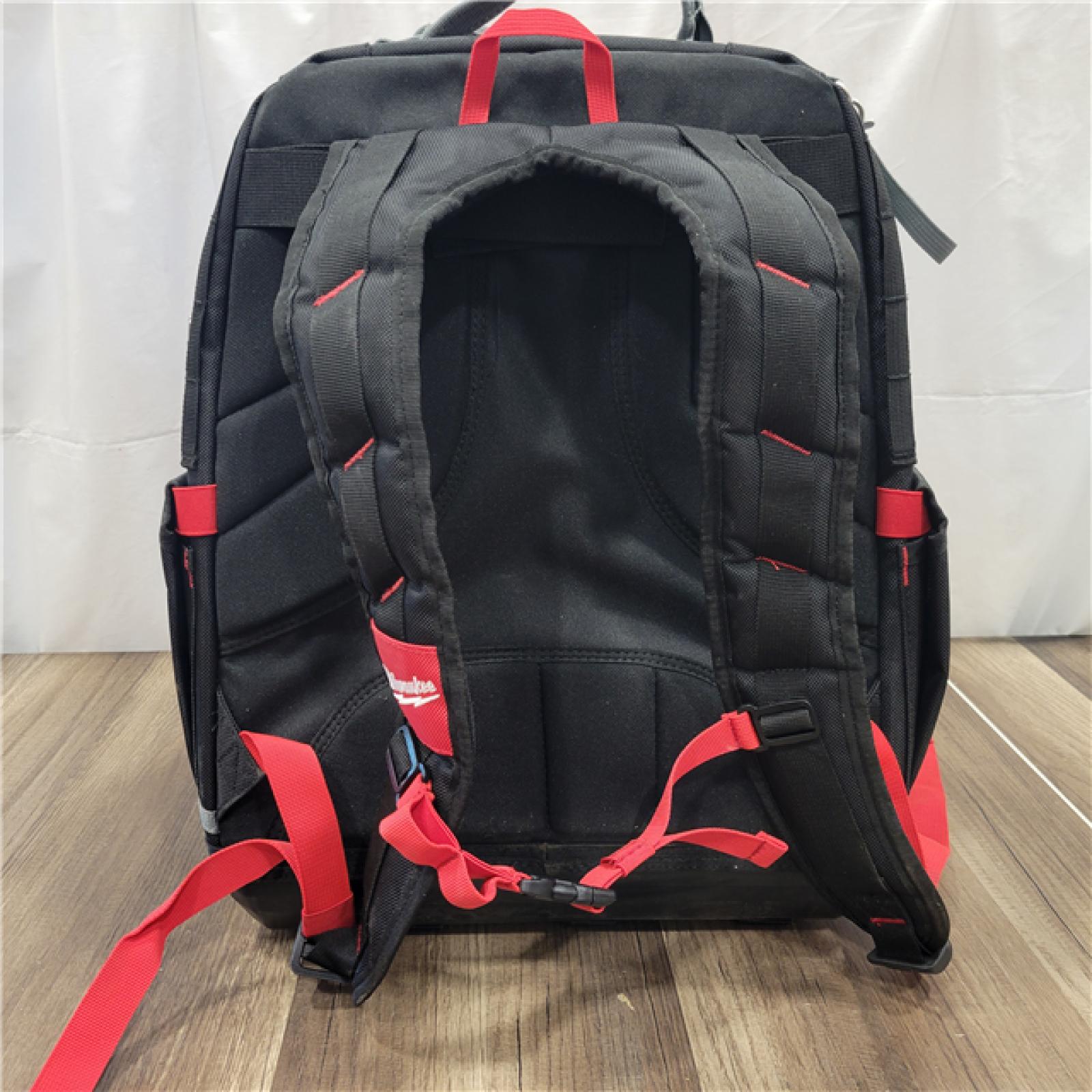 AS-IS  Milwaukee Tool PACKOUT 48 Pocket, Ballistic Polyester, Red/Black Backpack Tool Bag - 11-13/16 Wide X 15-3/4 High X 15-3/4 Deep | Part #48-22-8301