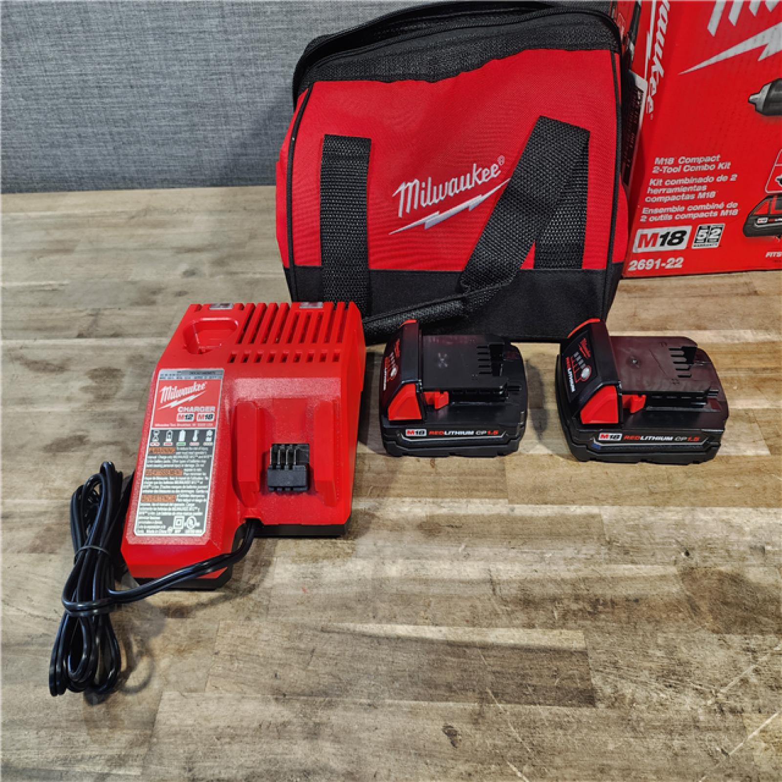 HOUSTON LOCATION - AS-IS Milwaukee 18V Cordless Brushed 2-Tool Drill/Driver and Impact Driver Kit