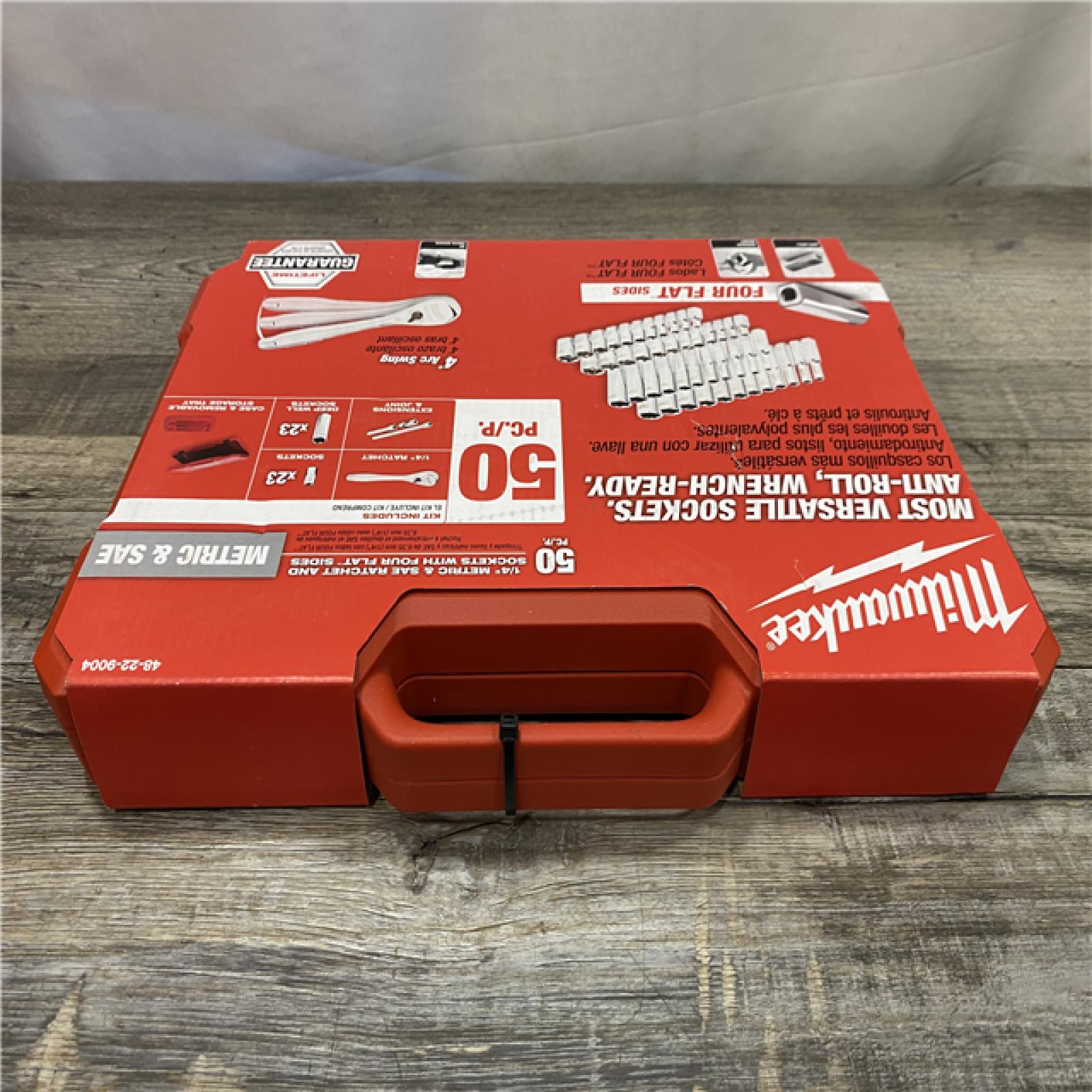 NEW - Milwaukee 1/4 in. Drive SAE/Metric Ratchet and Socket Mechanics Tool Set (50-Piece)