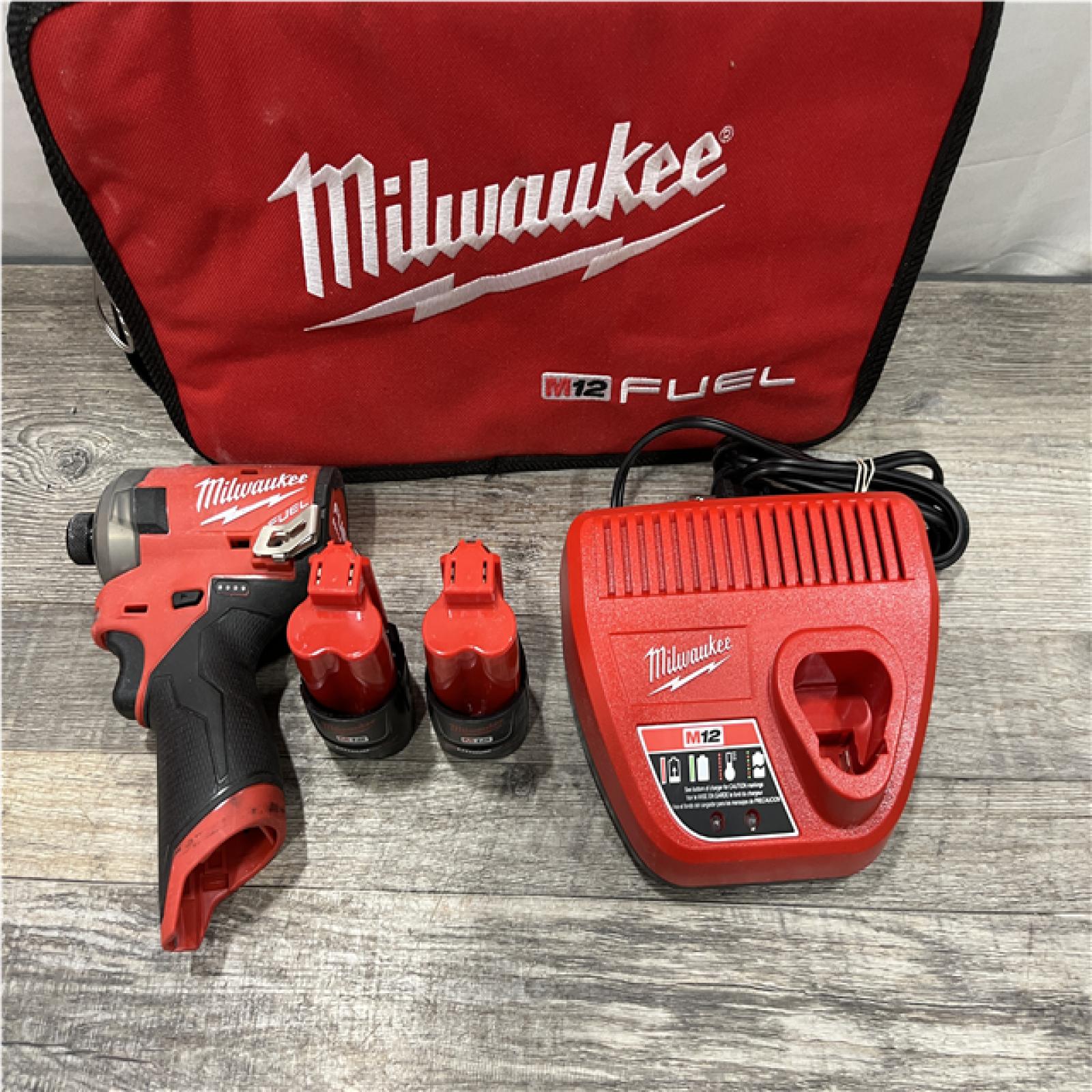 AS-IS Milwaukee FUEL SURGE 12V Lithium-Ion Brushless Cordless 1/4 in. Hex Impact Driver Compact Kit