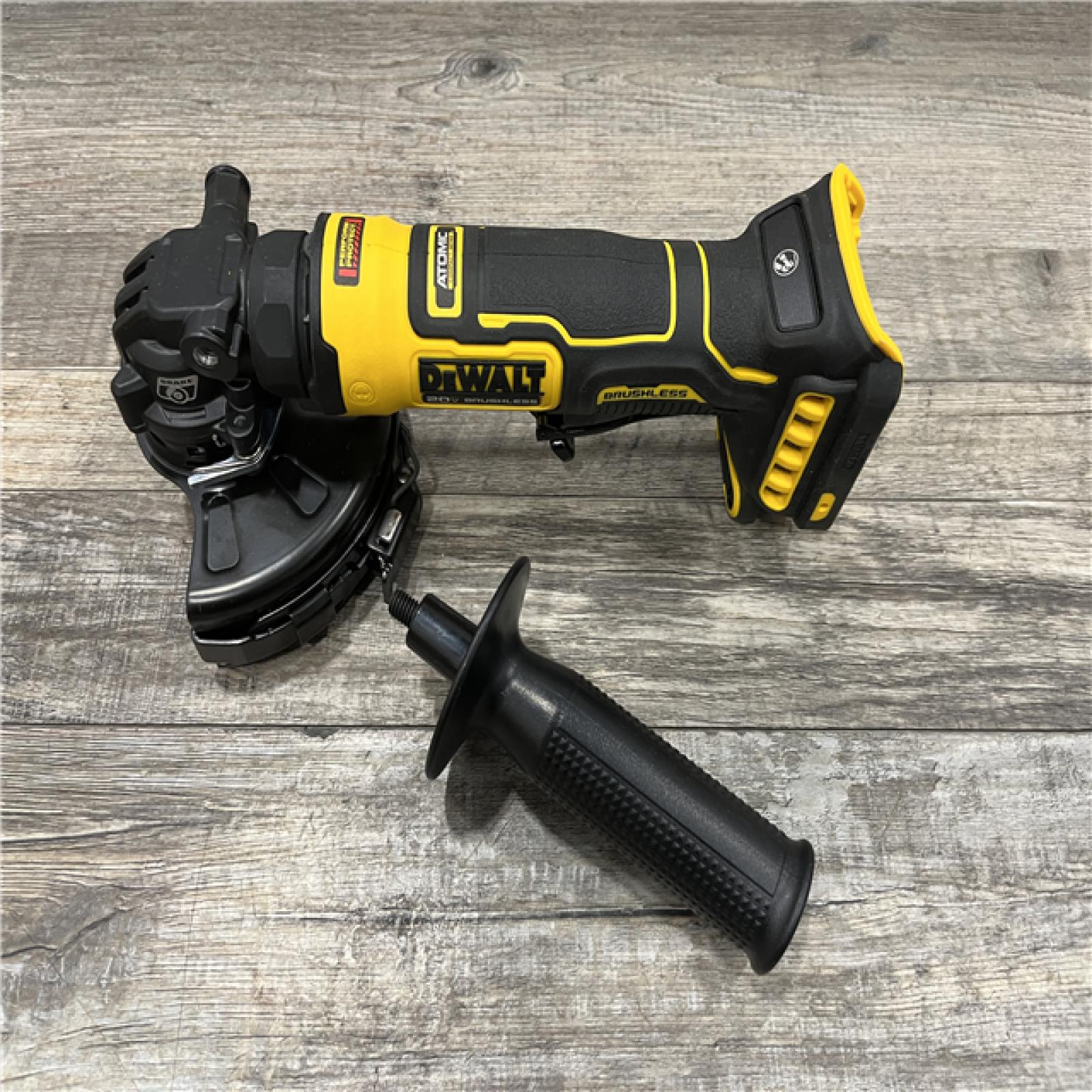 AS-IS DEWALT ATOMIC 20V MAX Cordless 4-1/2 in. Angle Grinder with Paddle Switch (Tool Only)