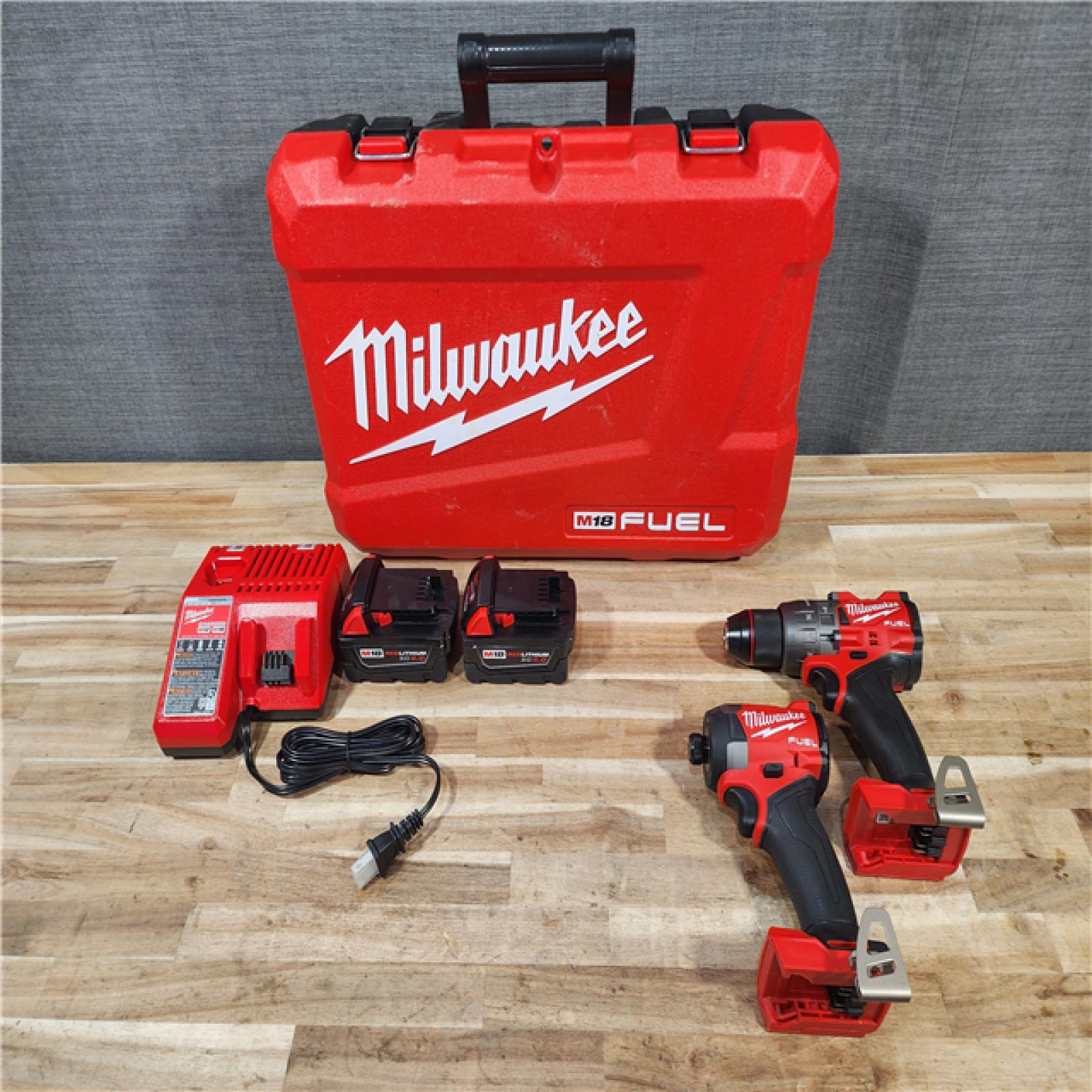 HOUSTON LOCATION - AS-IS (APPEARS LIKE NEW) Milwaukee FUEL 18V Lithium-Ion Brushless Cordless Hammer Drill and Impact Driver Combo Kit