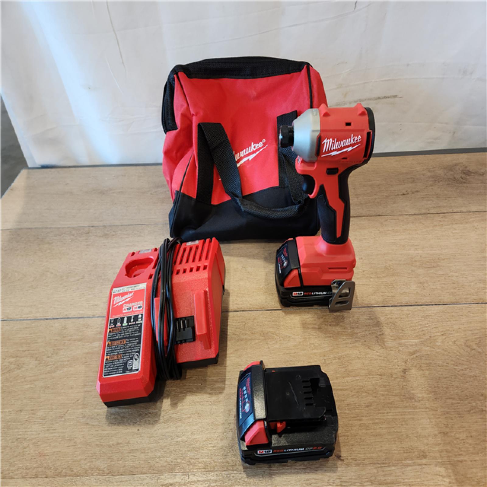 AS-IS- Milwaukee M18 Compact Brushless 1/4  Hex Impact Driver Kit