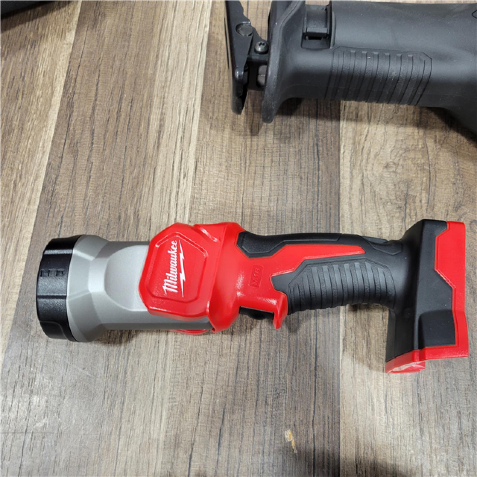 AS-IS  MILWAUKEE M18 18V Lithium-Ion Cordless Combo Tool Kit with Two 3.0Ah Batteries, 1-Charger, 1-Tool Bag (4-Tool)