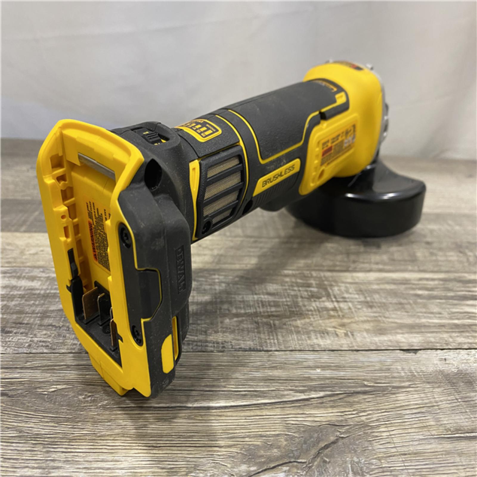 AS-IS DEWALT 20-Volt Max XR Brushless Cordless 4-1/2 in. - 5 in. Variable Speed Angle Grinder with Slide Switch (Tool Only)