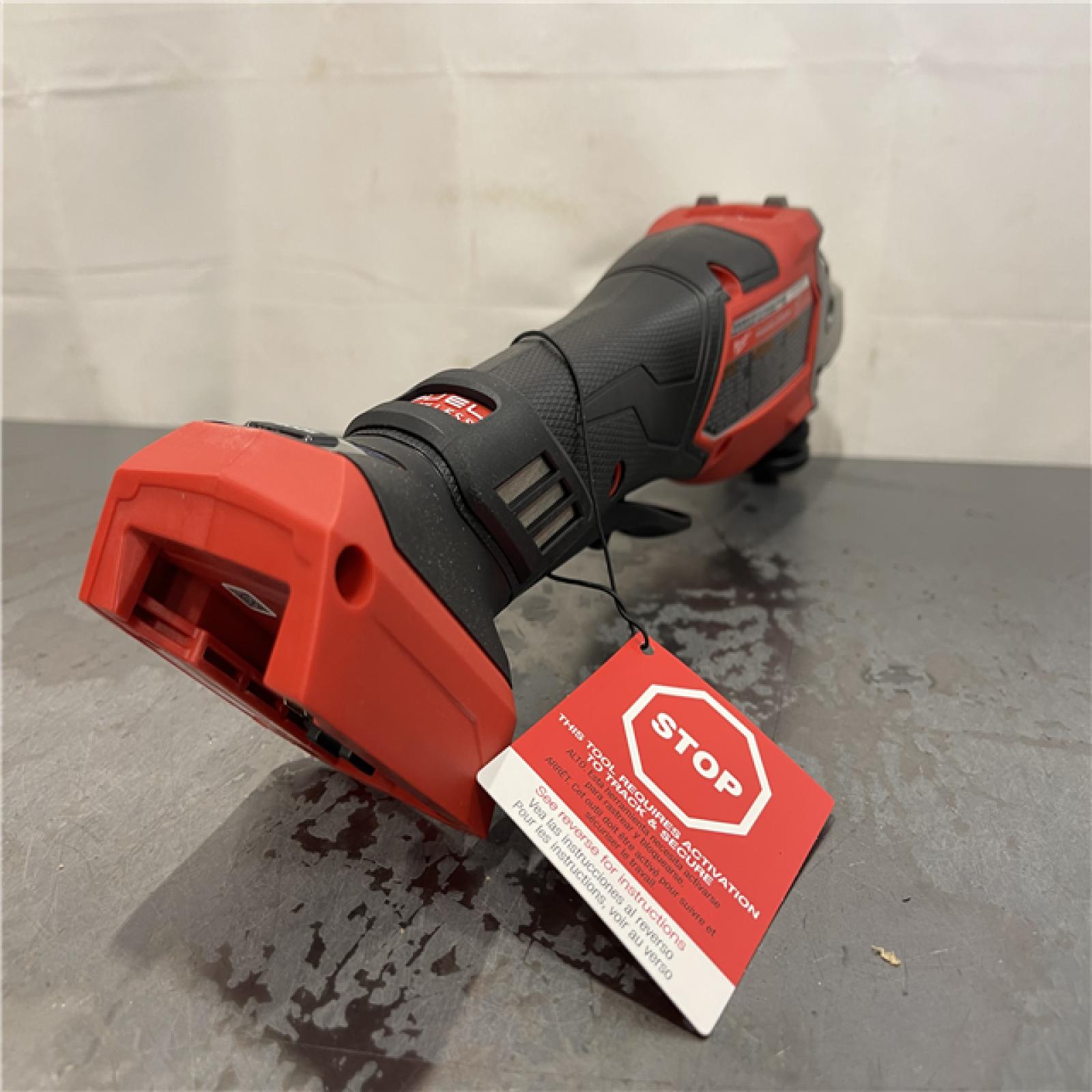 AS-IS - Milwaukee M18 FUEL ONE-KEY 18V Lithium-Ion Brushless Cordless 4-1/2 in./6 in. Variable Speed Braking Grinder
