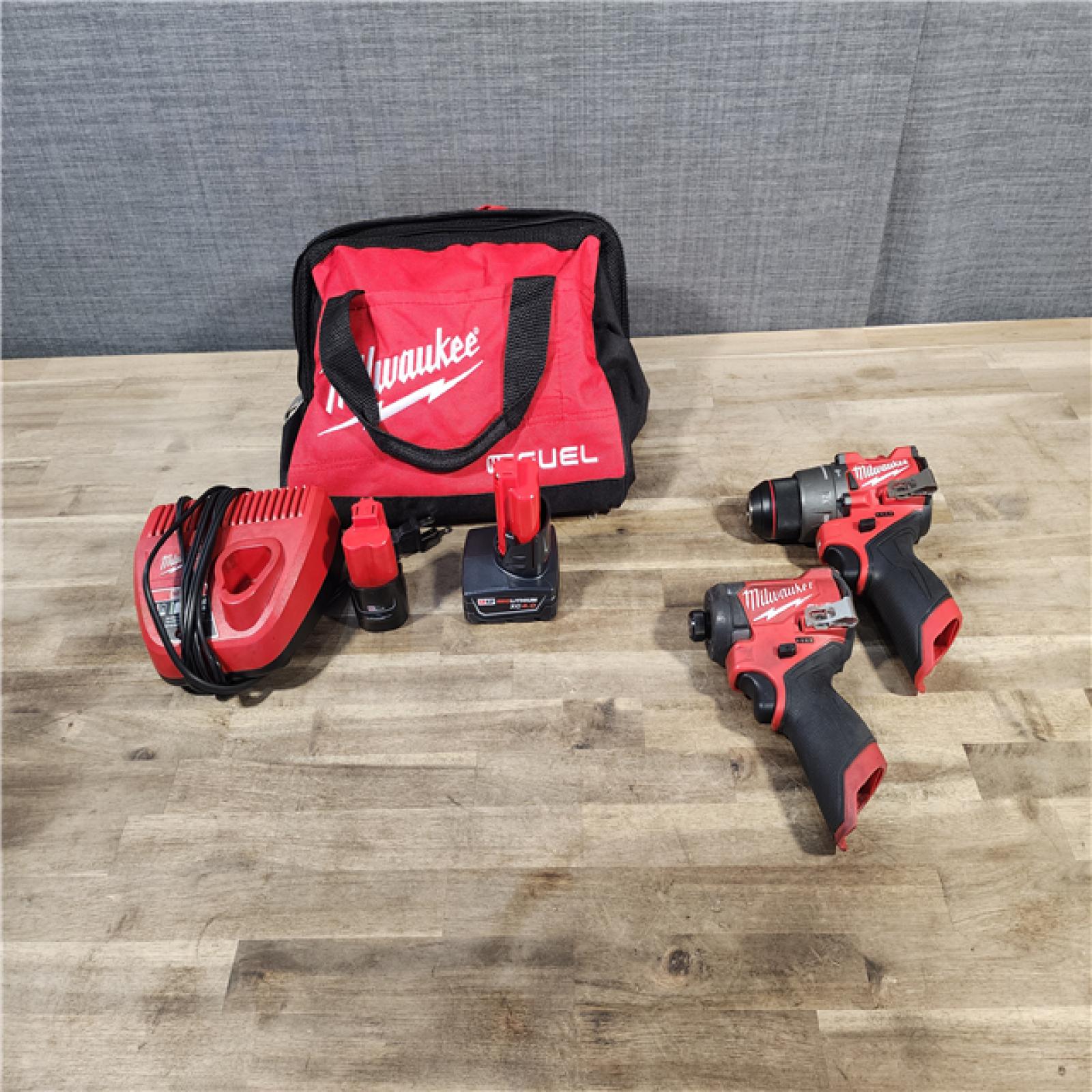 HOUSTON LOCATION - AS-IS Milwaukee 3497-22 12V Brushless Hammer Drill and Impact Driver Combo Kit