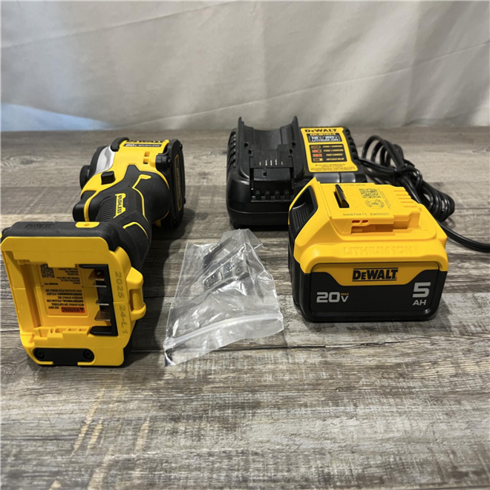 AS-IS DEWALT ATOMIC 20V MAX Lithium-Ion Cordless 1/4 in. Brushless Impact Driver Kit
