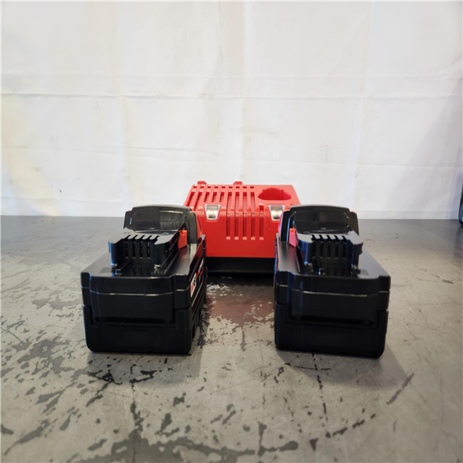 AS-IS- Milwaukee 18-Volt Lithium-Ion XC Starter Kit with Two 5.0Ah Batteries and Charger