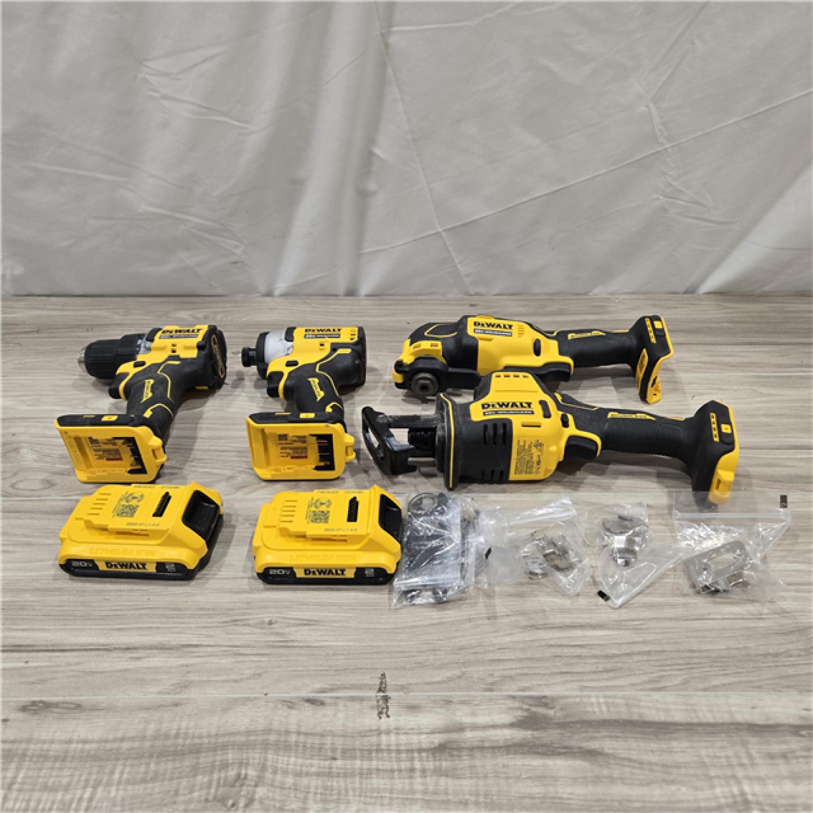 AS-IS DeWalt 20V MAX ATOMIC Cordless Brushless 4-Tool Combo Kit