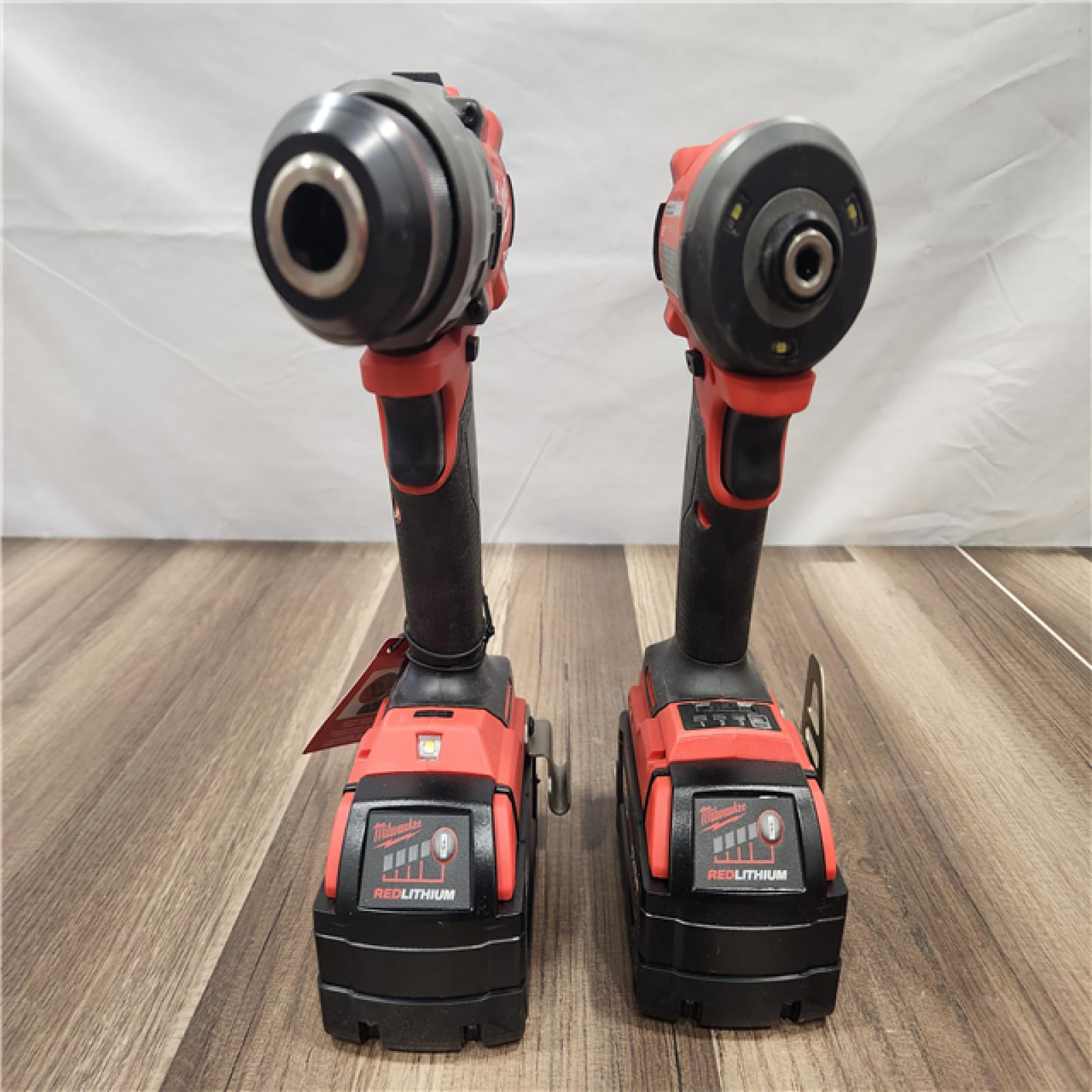 AS-IS- Good - M18 FUEL 18V Lithium-Ion Brushless Cordless Combo Kit  with Two 5.0 Ah Batteries  1 Charger 1 Tool Bag