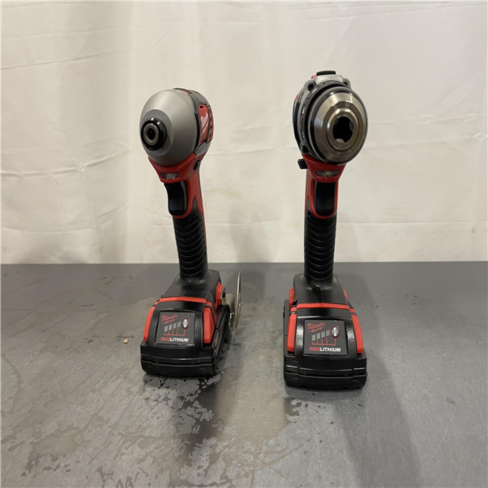 AS-IS - Milwaukee M18 18V Lithium-Ion Cordless Drill Driver/Impact Driver Combo Kit (2-Tool)