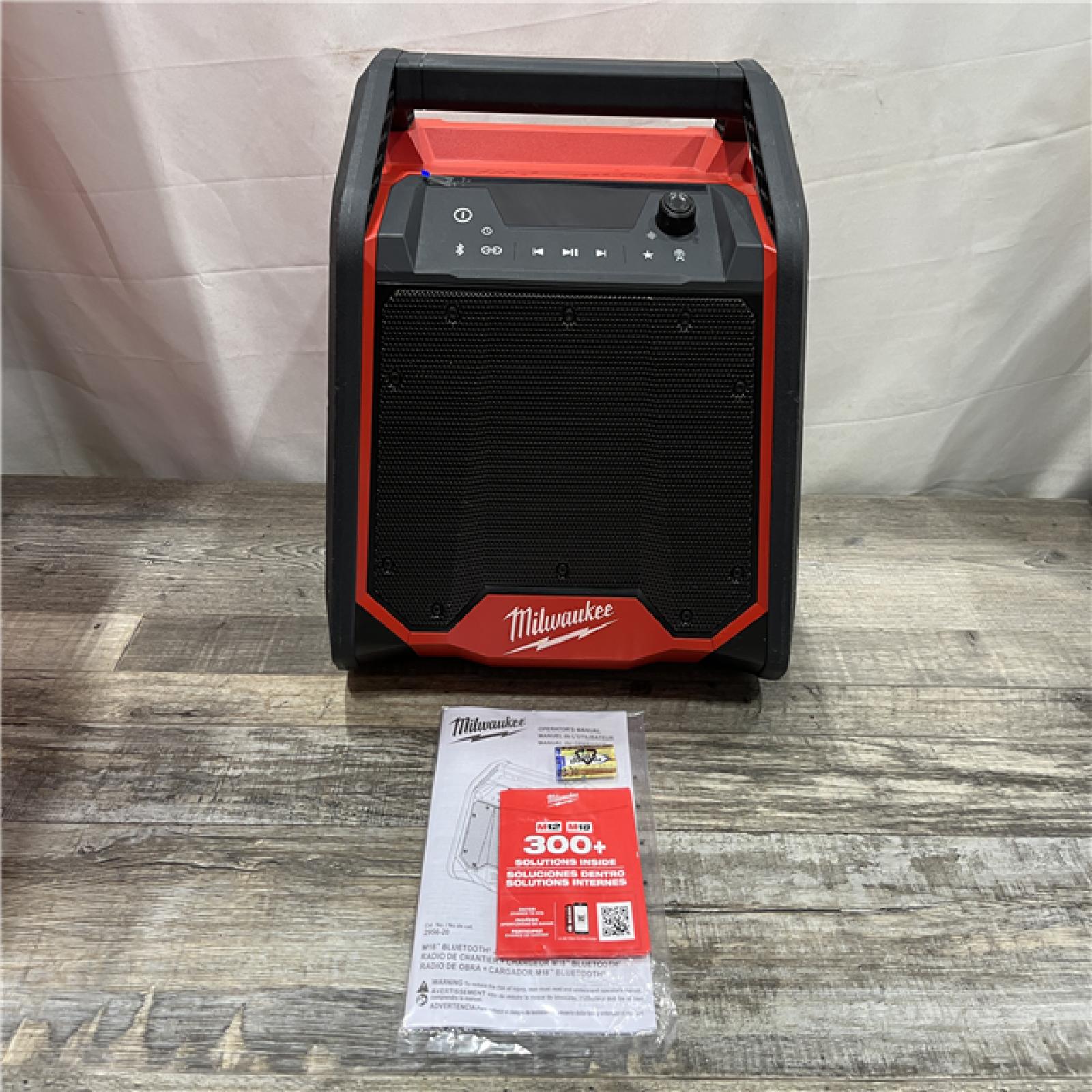 AS-IS Milwaukee Lithium-Ion Cordless PACKOUT Jobsite Radio/Speaker with Built-In Charger