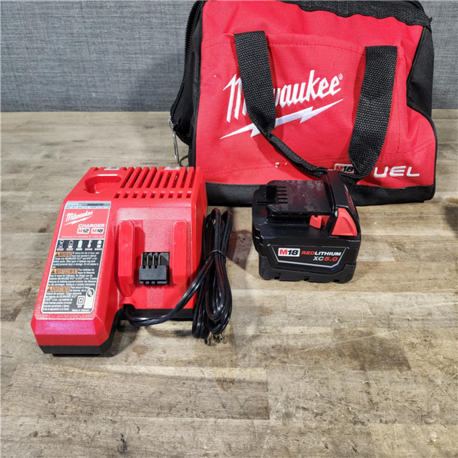 HOUSTON LOCATION - AS-IS (APPEARS LIKE NEW) Milwaukee M18 1/2 in. Cordless Brushless High Torque Impact Wrench Kit (Battery & Charger)