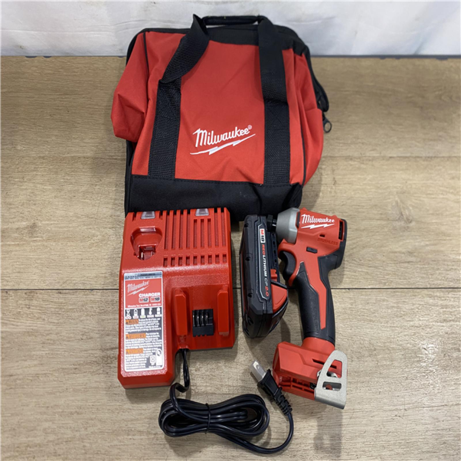 AS-IS Milwaukee 18-Volt Lithium-Ion Compact Brushless Cordless 1/4 in. Impact Driver Kit
