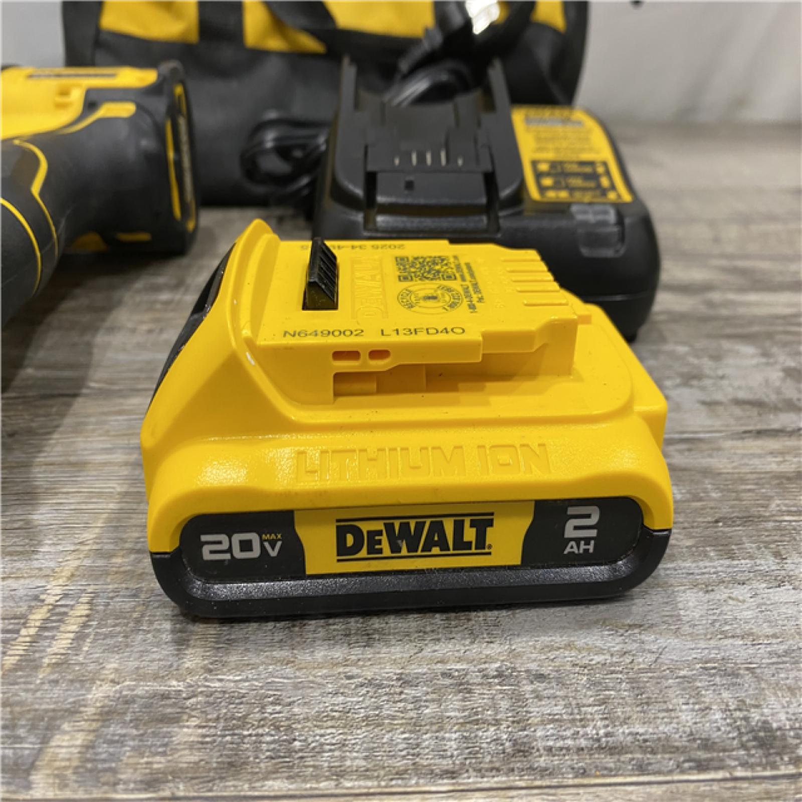 AS-IS DEWALT Atomic 20V Max Lithium-Ion Brushless Cordless Compact 1/4 in. Impact Driver Kit