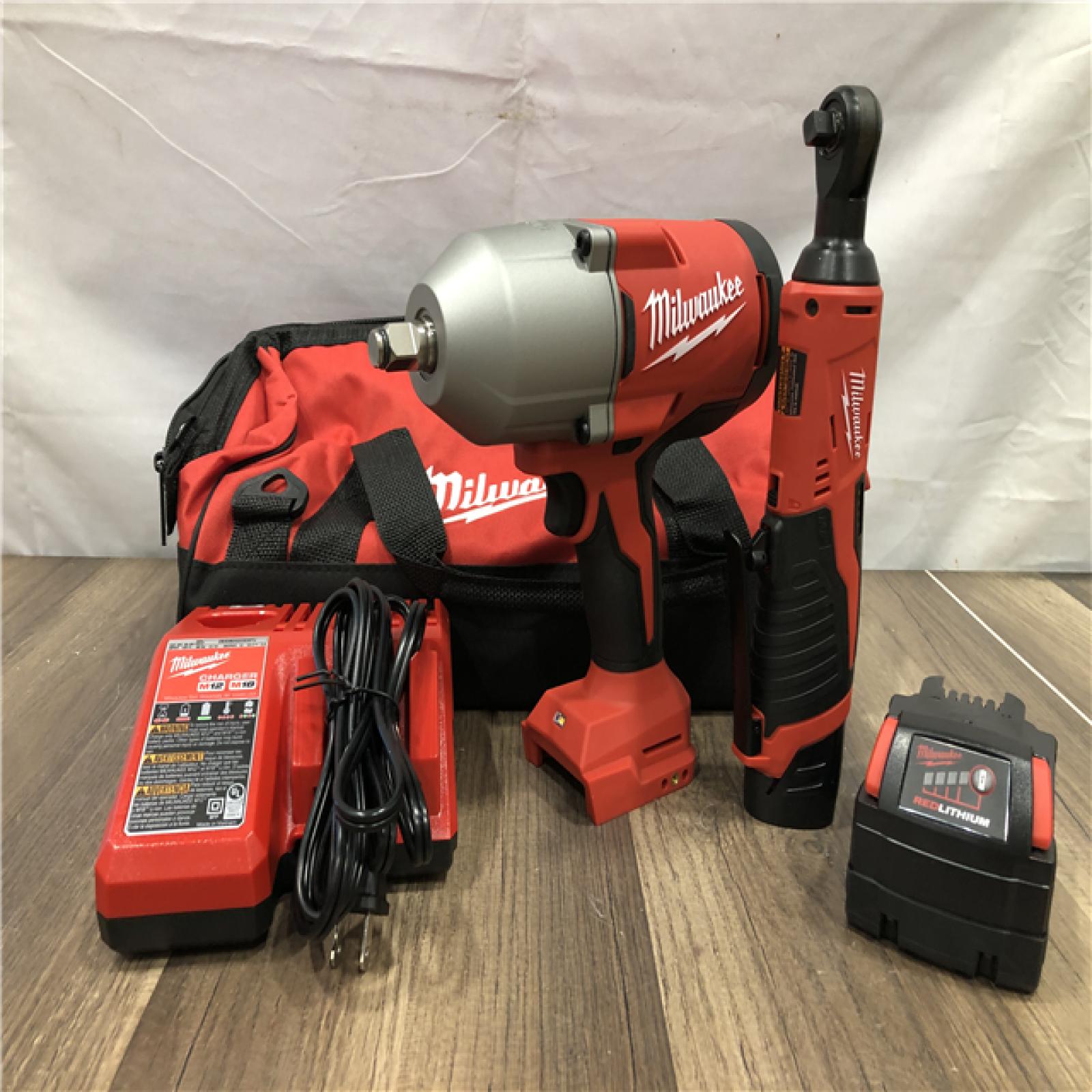 AS-IS Milwaukee 12/18V Lithium-Ion Cordless 3/8 in. Ratchet and 1/2 in. High Torque Impact Wrench with Friction Ring Combo Kit