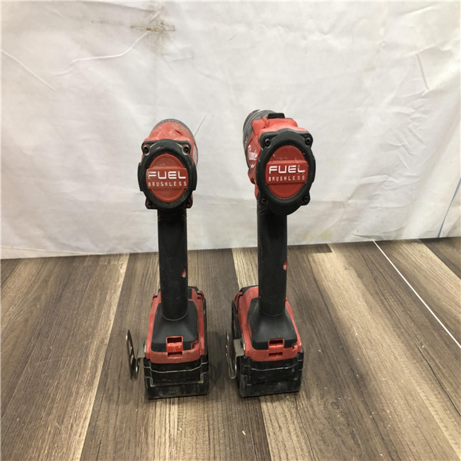 AS-IS Milwaukee FUEL 18V Lithium-Ion Brushless Cordless Hammer Drill and Impact Driver Combo Kit