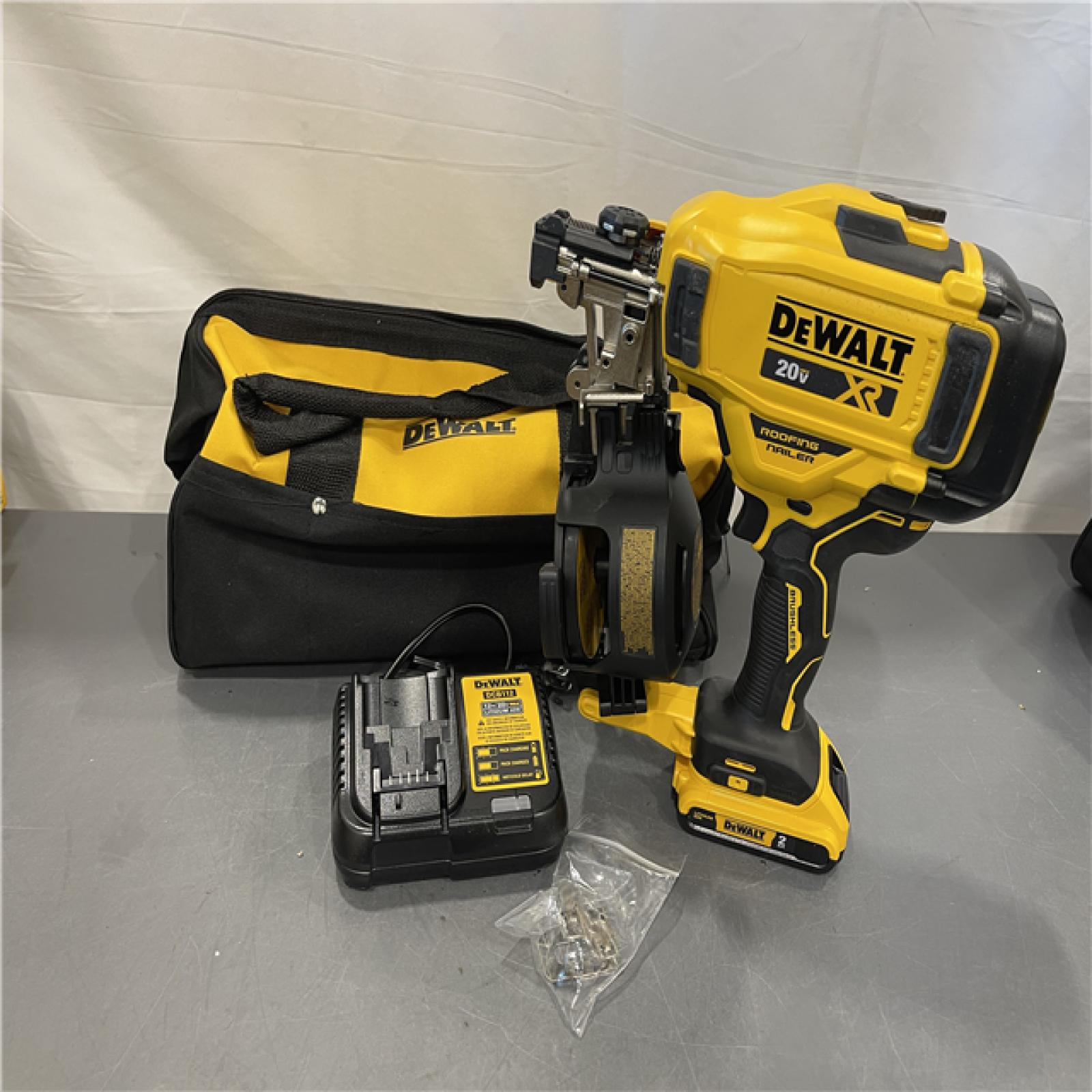 AS-IS - DEWALT 20V MAX Lithium-Ion 15-Degree Electric Cordless Roofing Nailer Kit