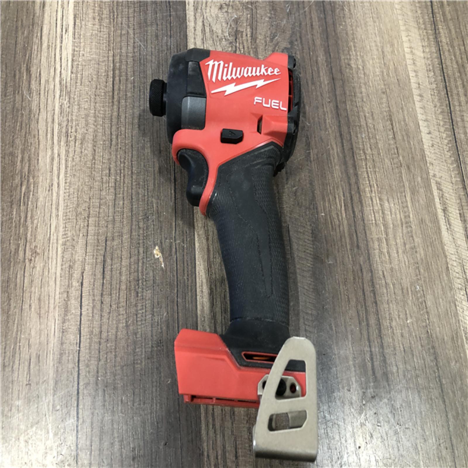 AS-IS Milwaukee  FUEL 18V Lithium-Ion Brushless Cordless 1/4 in. Hex Impact Driver (Tool-Only)
