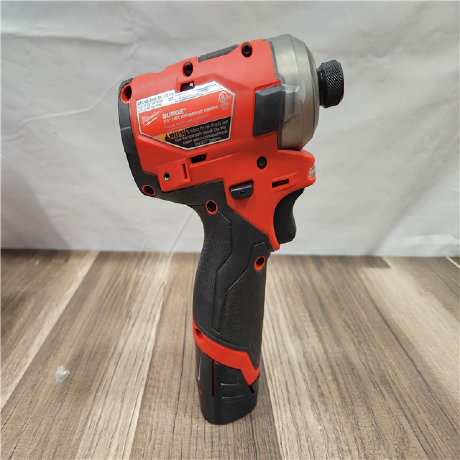 AS-IS- Milwaukee M12 FUEL SURGE 12V Lithium-Ion Brushless Cordless 1/4 in. Hex Impact Driver Compact Kit W/Two 2.0Ah Batteries  Bag