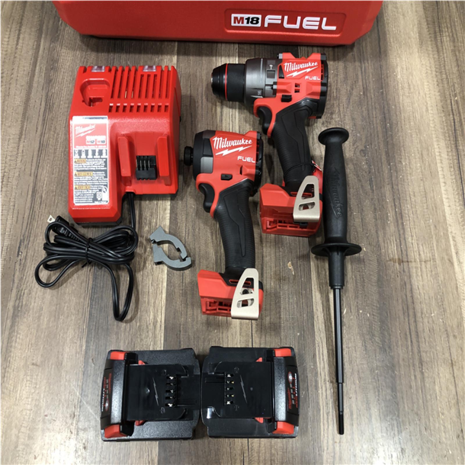 AS-IS Milwaukee FUEL 18V Lithium-Ion Brushless Cordless Hammer Drill and Impact Driver Combo Kit