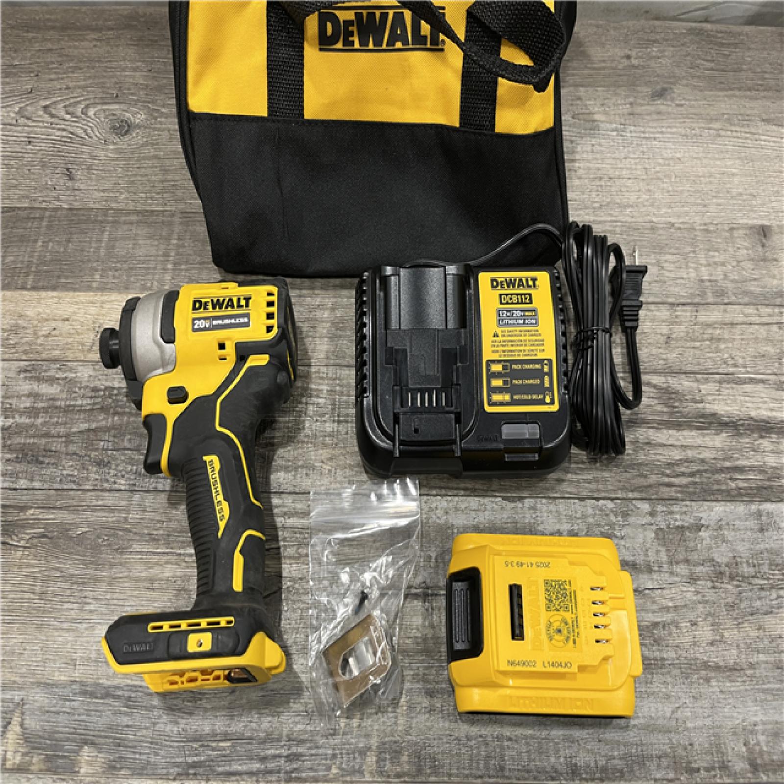 AS-IS DEWALT Atomic 20V Max Lithium-Ion Brushless Cordless Compact 1/4 in. Impact Driver Kit