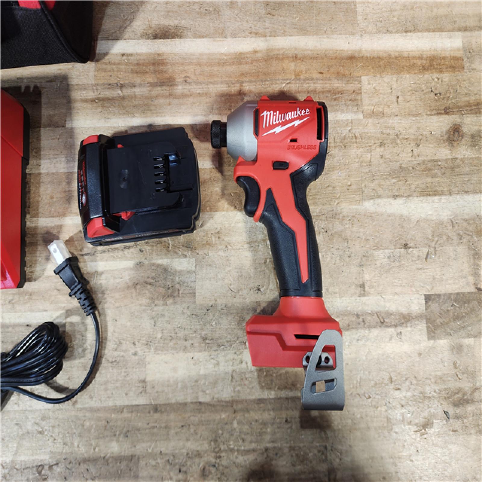 HOUSTON LOCATION - AS - IS Milwaukee 18-Volt Lithium-Ion Compact Brushless Cordless 1/4 in. Impact Driver Kit