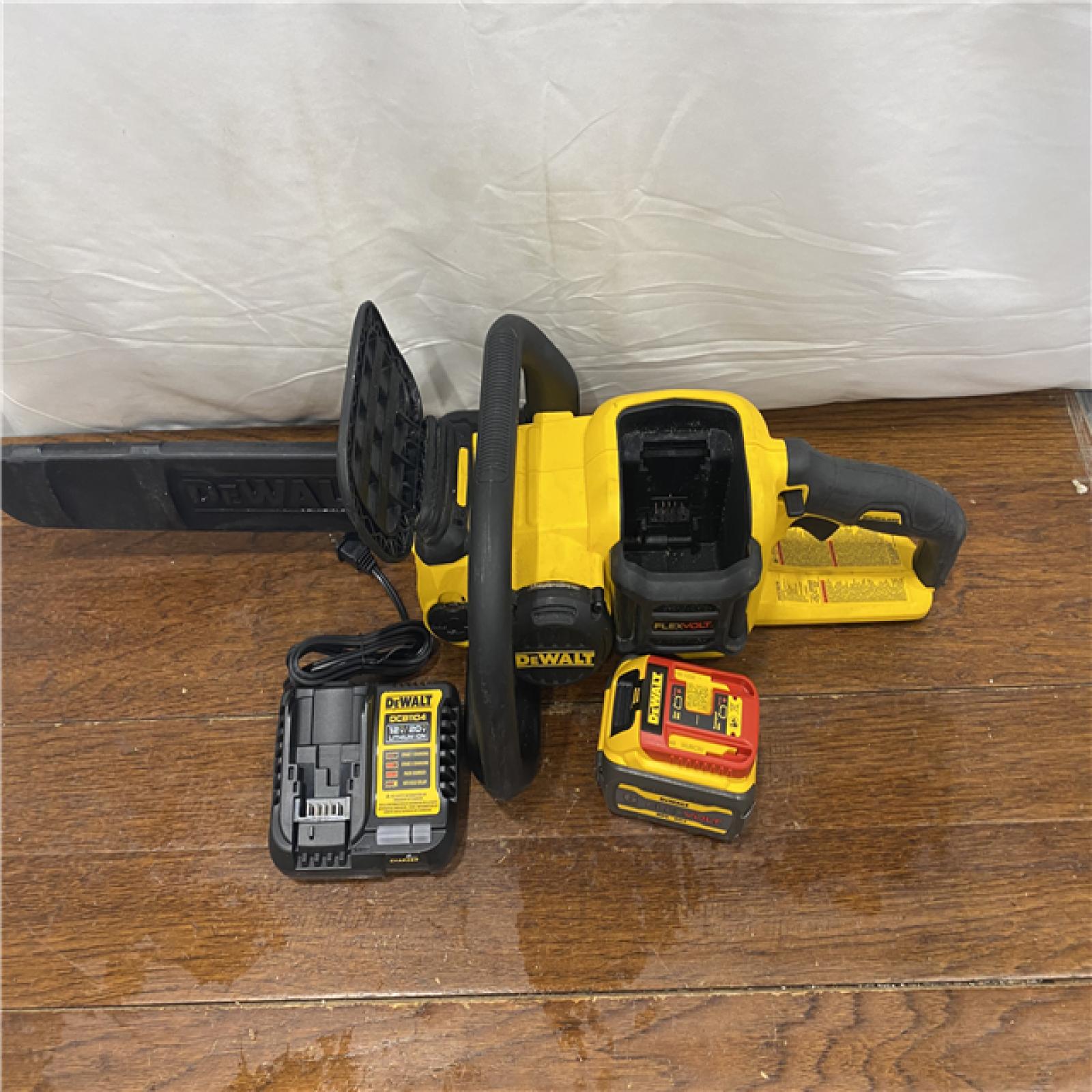 AS-IS DEWALT  FLEXVOLT 60V MAX 16in. Brushless Cordless Battery Powered Chainsaw Kit with (1) FLEXVOLT 2 Ah Battery & Charger