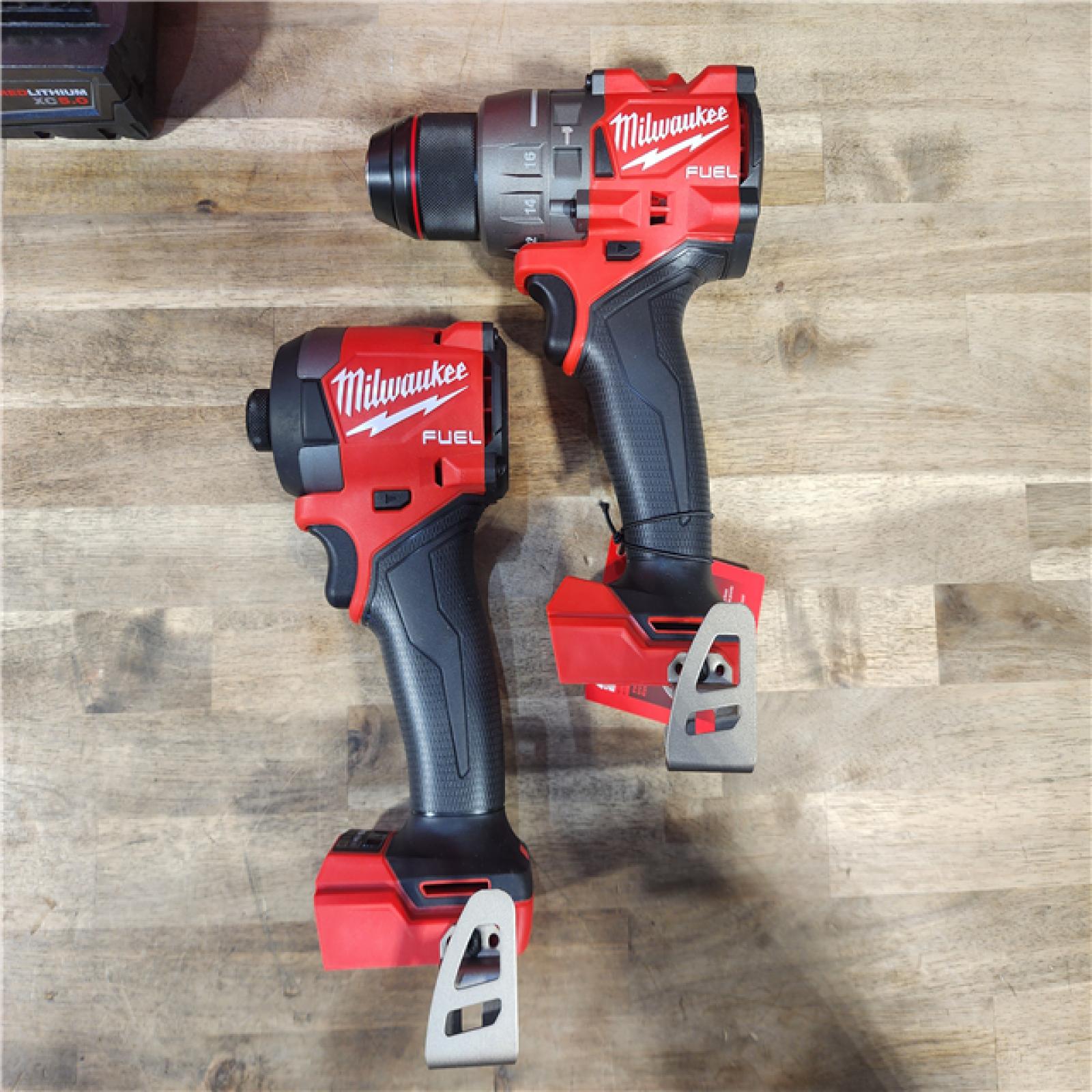 HOUSTON LOCATION - AS-IS (APPEARS LIKE NEW) MILWAUKEE M18 FUEL 18V Lithium-Ion Brushless Cordless Hammer Drill and Impact Driver Combo Kit (2-Tool) with 2 Batteries