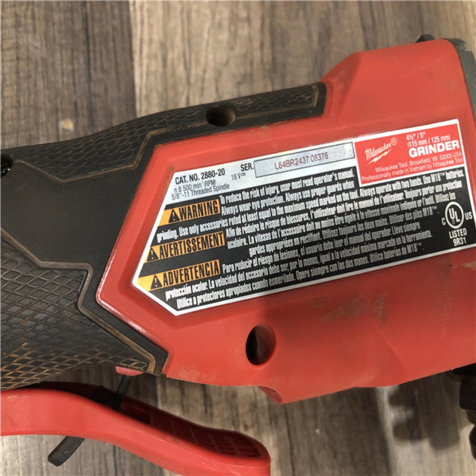 AS-IS Milwaukee FUEL 18V Lithium-Ion Brushless Cordless 4-1/2 in./5 in. Grinder w/Paddle Switch (Tool-Only)