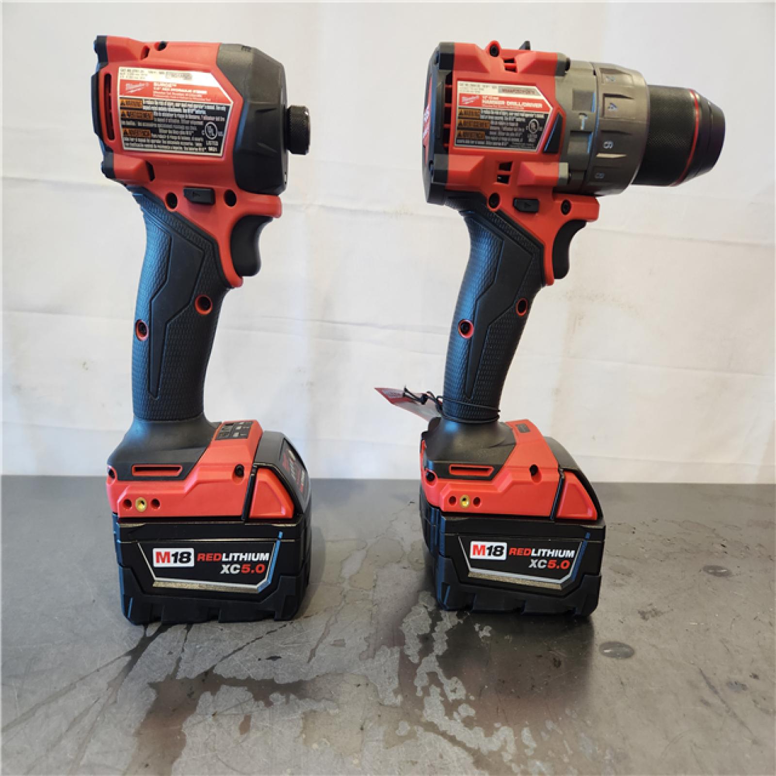 AS-IS- M18 FUEL 18V Lithium-Ion Brushless Cordless Hammer Drill & SURGE Impact Driver Combo Kit (2-Tool) W/ (2) 5.0 Ah Battery