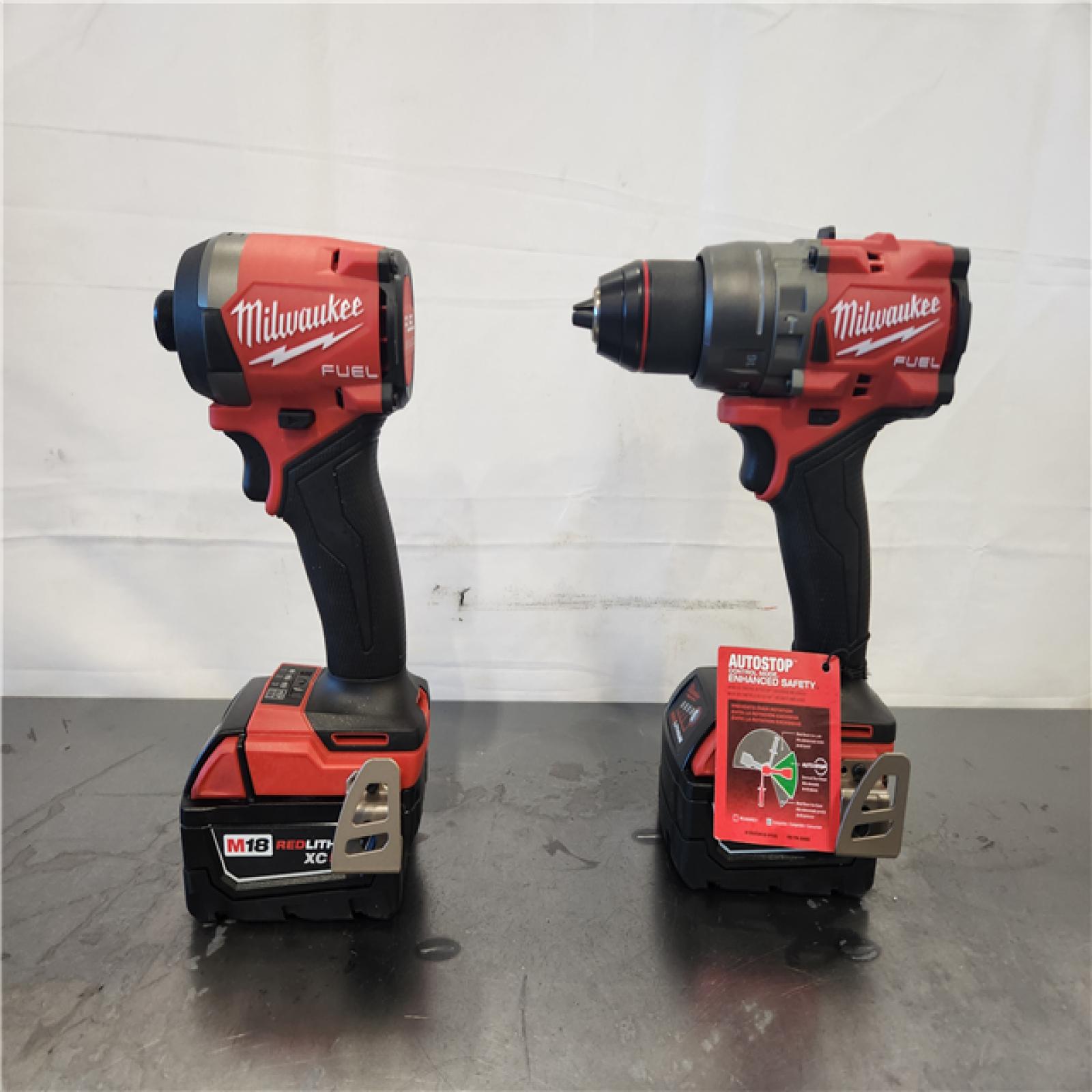 AS-IS- Milwaukee FUEL 18V Lithium-Ion Brushless Cordless Hammer Drill and Impact Driver Combo Kit