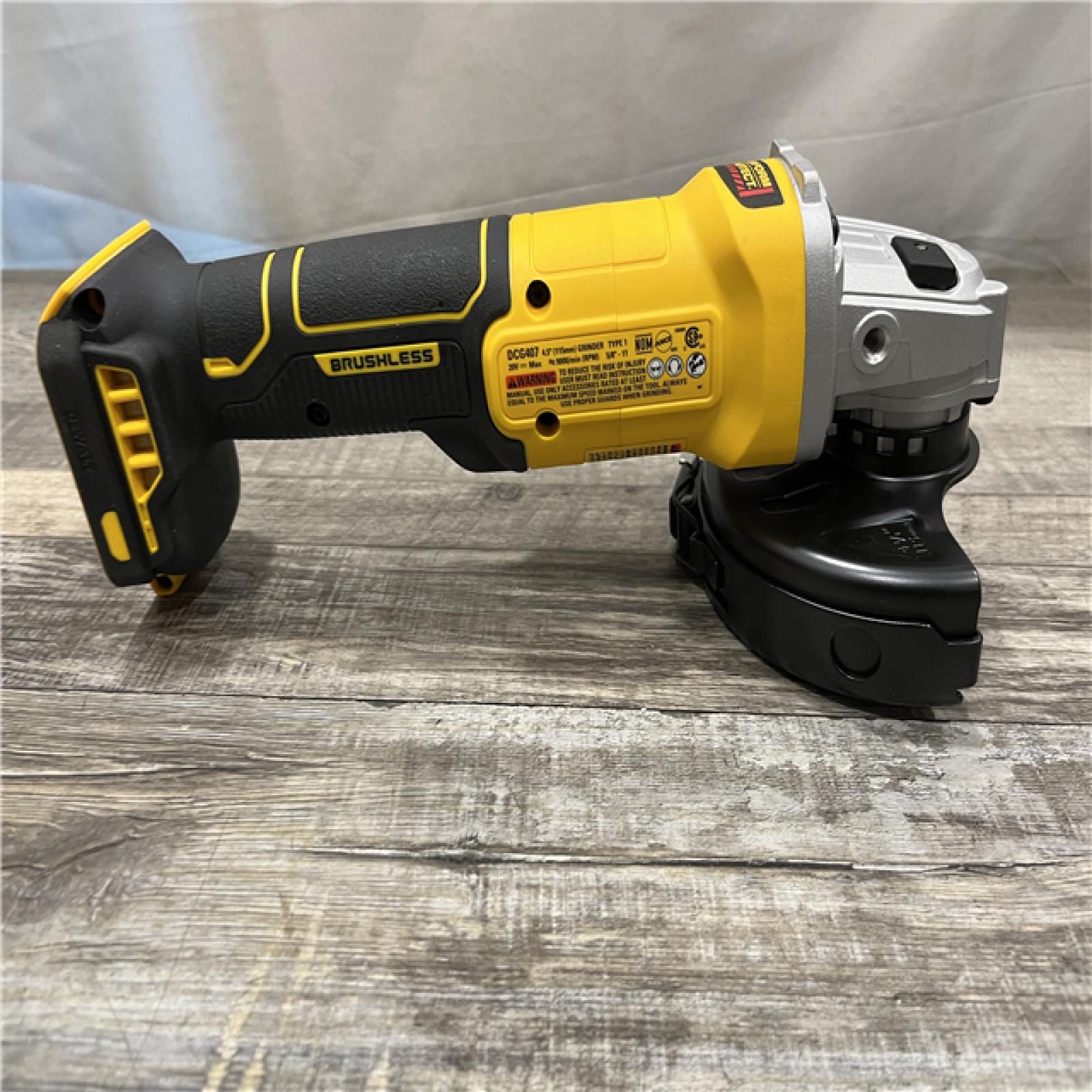 AS-IS DEWALT 20-Volt MAX Cordless Brushless 4-1/2 in. Angle Grinder with Slide Switch (Tool Only)