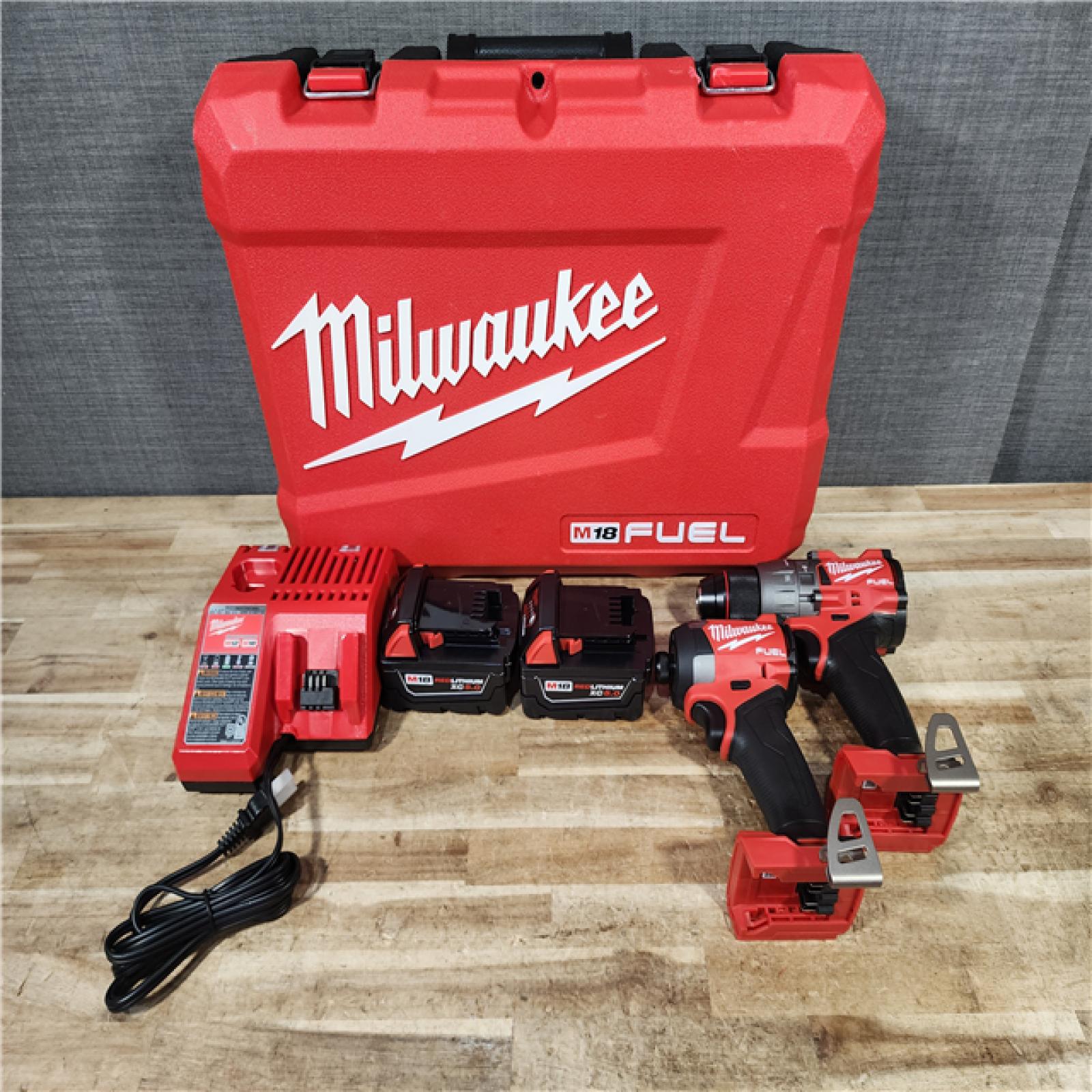 HOUSTON LOCATION - AS - IS Milwaukee FUEL 18V Lithium-Ion Brushless Cordless Hammer Drill and Impact Driver Combo Kit