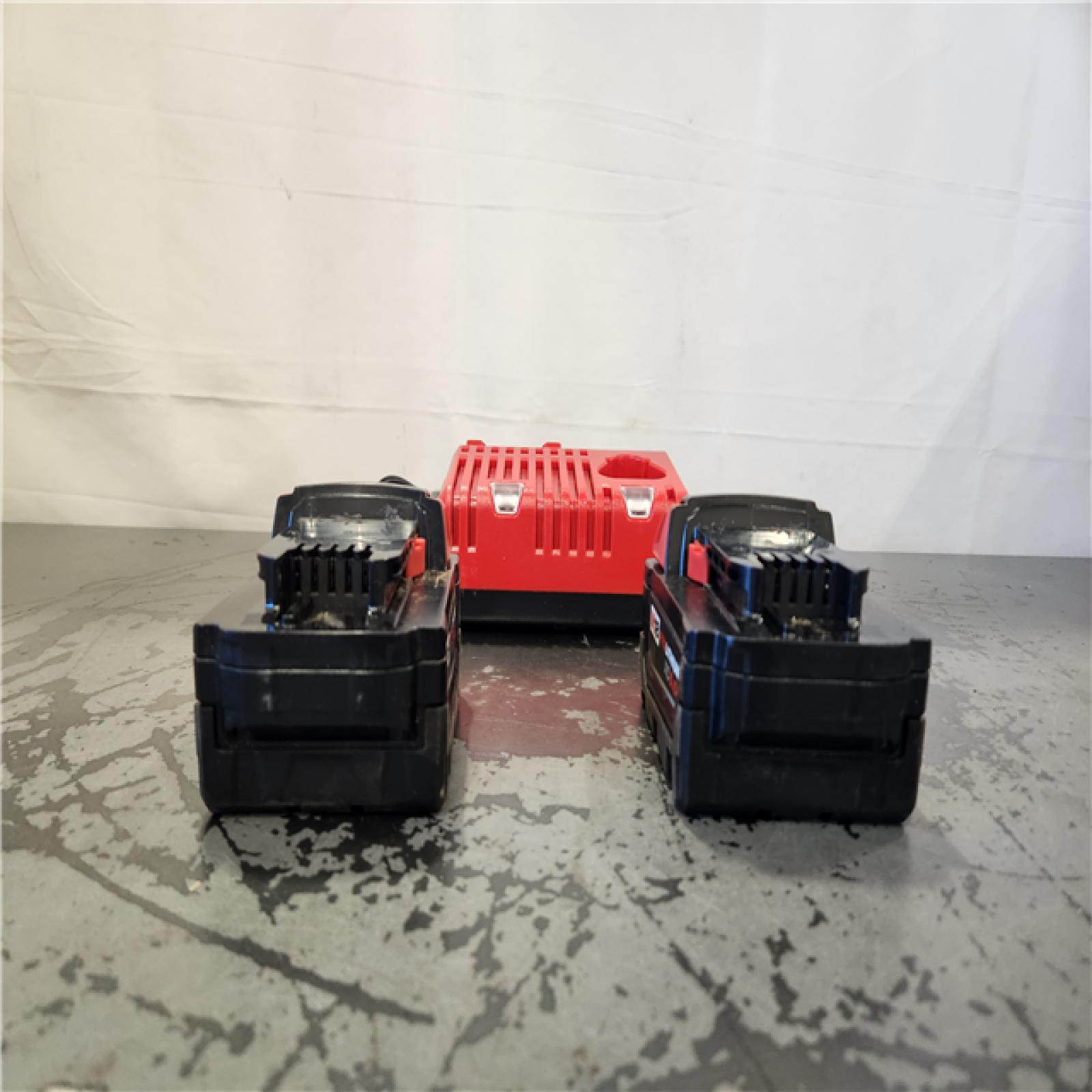 AS-IS- Milwaukee 18-Volt Lithium-Ion XC Starter Kit with Two 5.0Ah Batteries and Charger