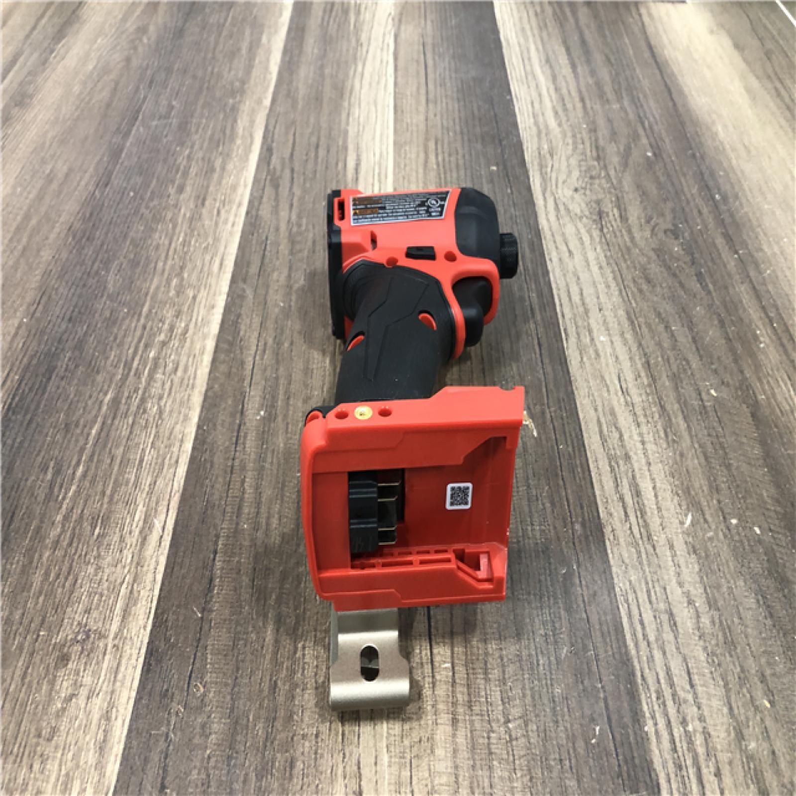 AS-IS Milwaukee FUEL SURGE 18V Lithium-Ion Brushless Cordless 1/4 in. Hex Impact Driver (Tool-Only)