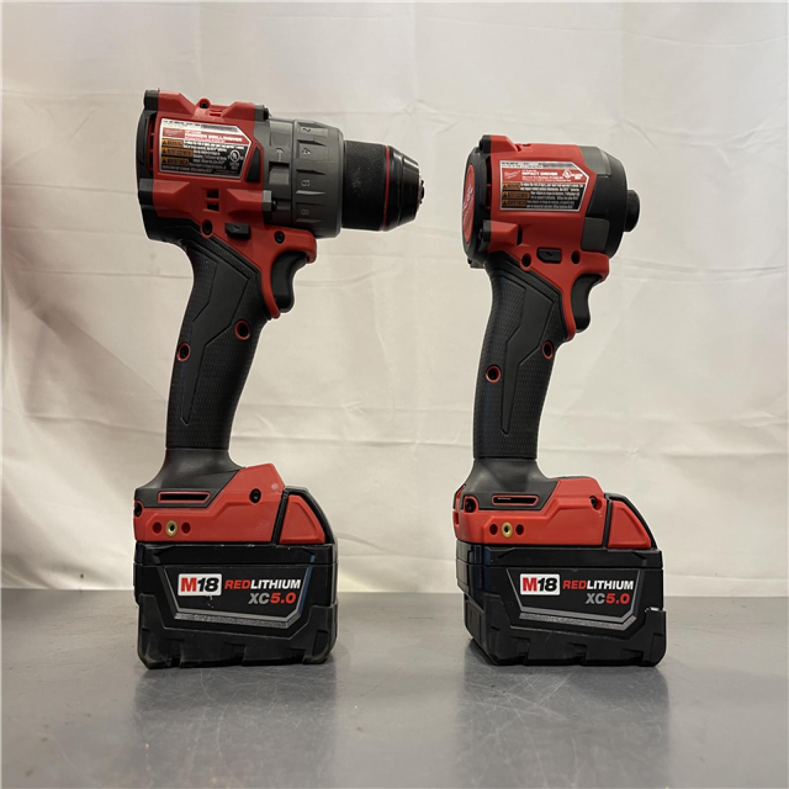 AS-IS - MILWAUKEE FUEL 18V Lithium-Ion Brushless Cordless Hammer Drill and Impact Driver Combo Kit