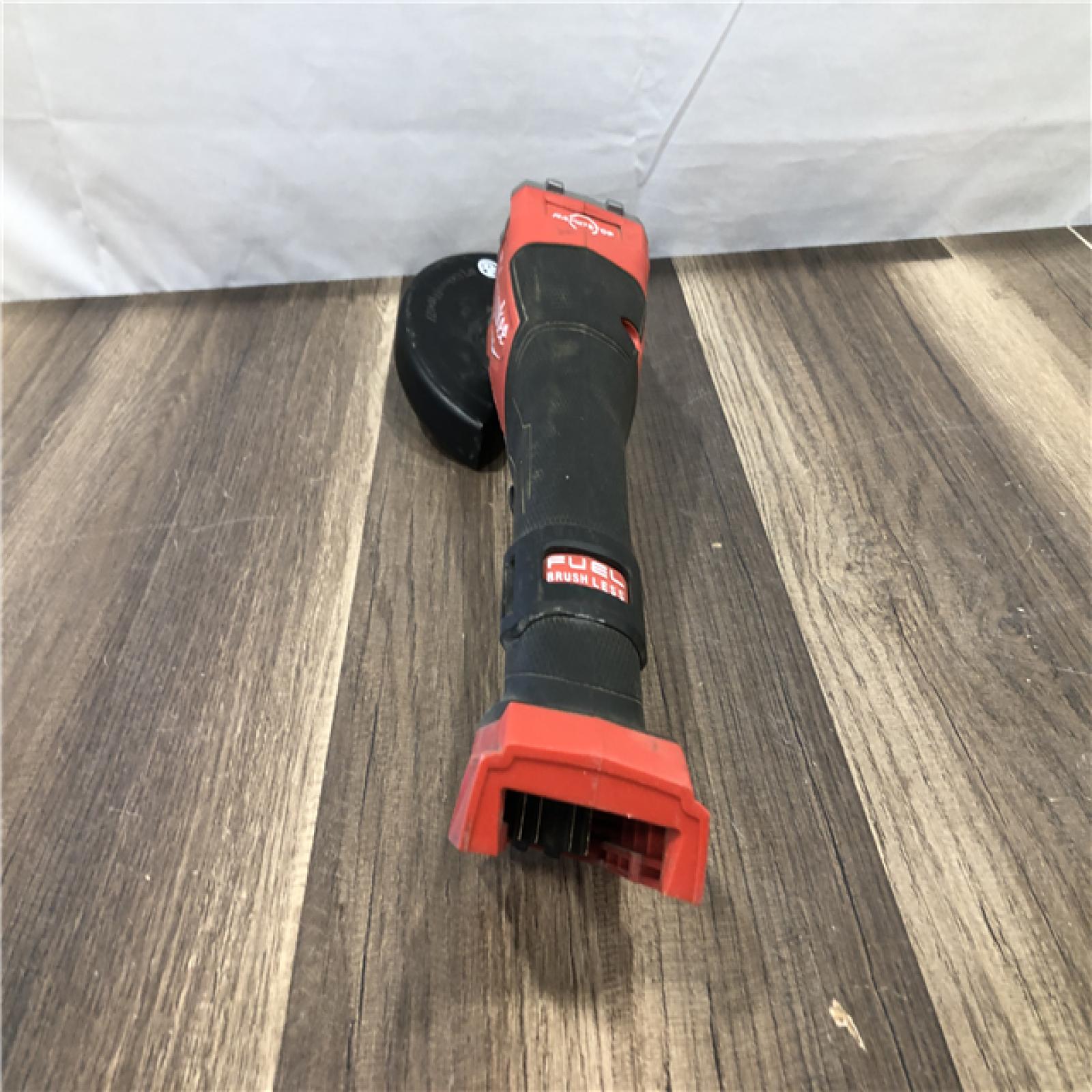 AS-IS Milwaukee  FUEL 18-Volt Lithium-Ion Brushless Cordless 4-1/2 in./6 in. Braking Grinder with Paddle Switch (Tool-Only)