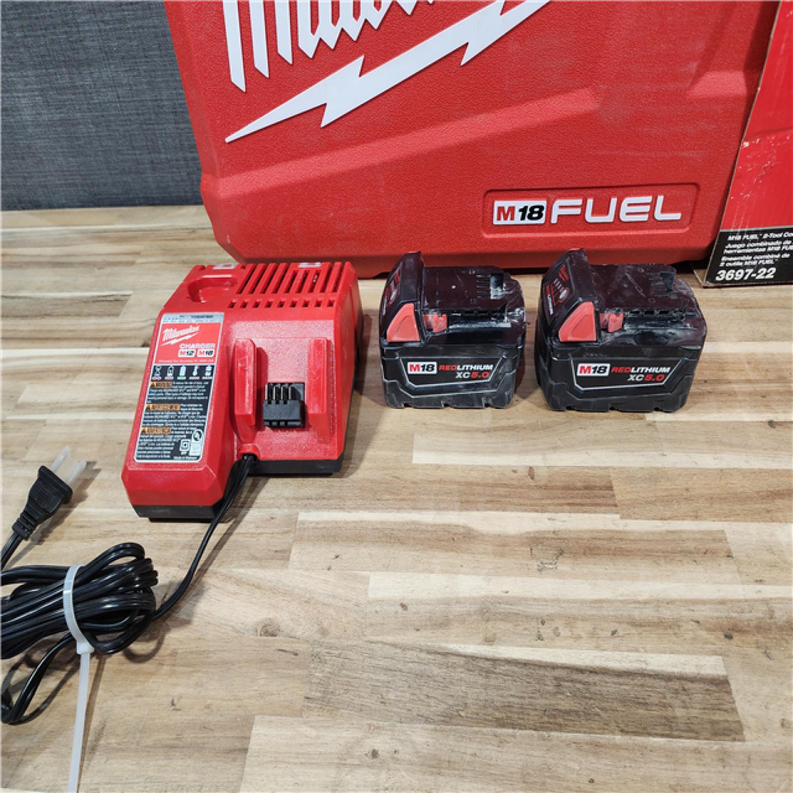 HOUSTON LOCATION - AS-IS Milwaukee  FUEL 18V Lithium-Ion Brushless Cordless Hammer Drill and Impact Driver Combo Kit