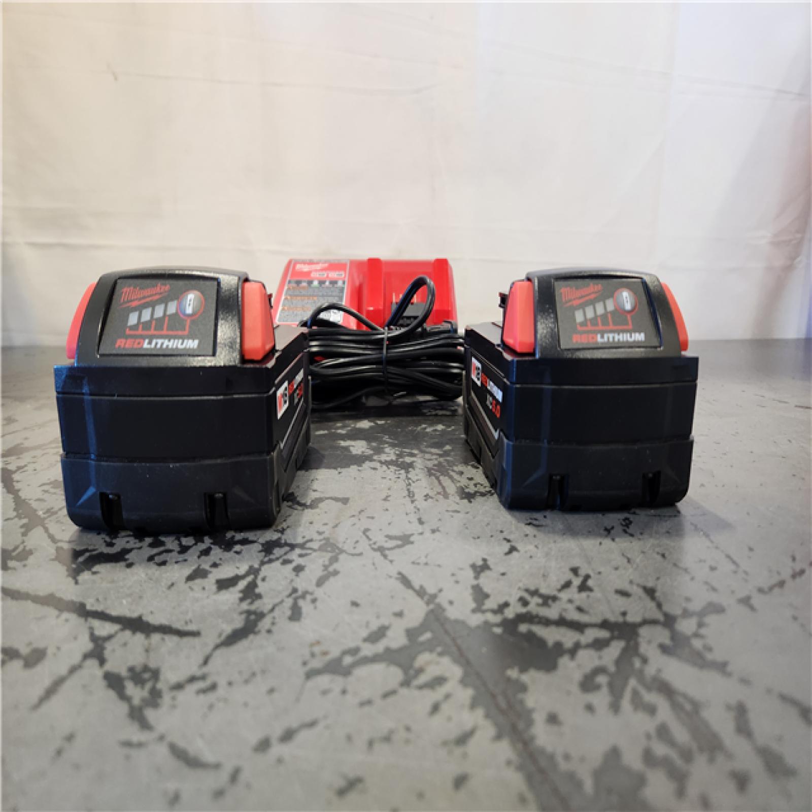 AS-IS- Milwaukee 18-Volt Lithium-Ion XC Starter Kit with Two 5.0Ah Batteries and Charger