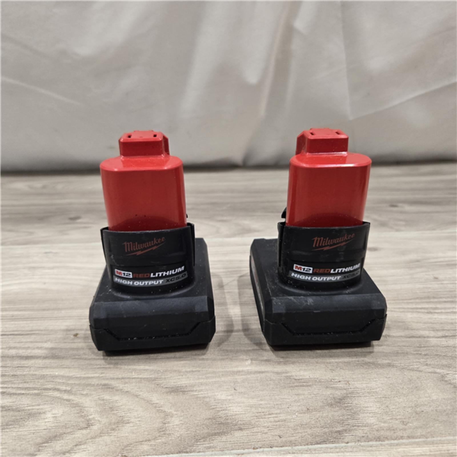AS-IS Milwaukee M12 12V Lithium-Ion XC High Output 5.0 Ah Battery Pack (2-Pack) Starter Kit