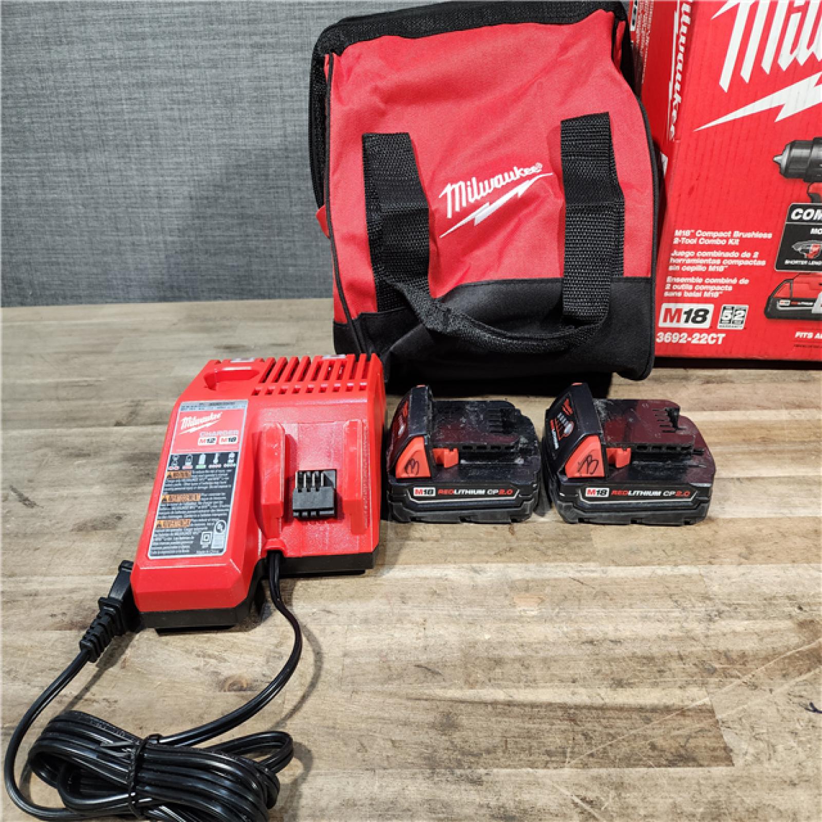 HOUSTON LOCATION - AS-IS Milwaukee M18 18V Lithium-Ion Brushless Cordless Compact Drill/Impact Combo Kit (2-Tool) W/(2) 2.0 Ah Batteries  Charger & Bag