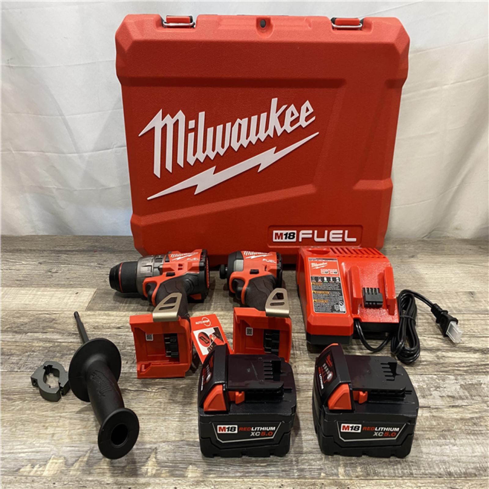 AS-IS Milwaukee FUEL 18V Lithium-Ion Brushless Cordless Hammer Drill and Impact Driver Combo Kit
