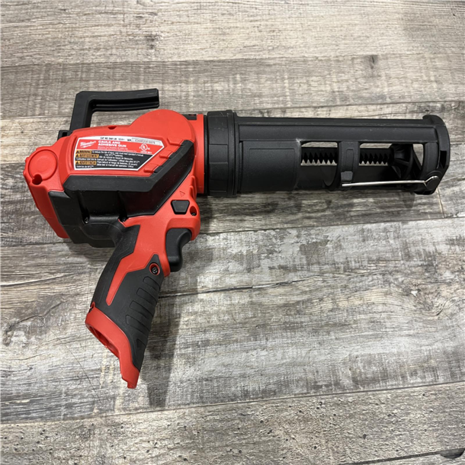 AS-IS Milwaukee 12V Lithium-Ion Cordless 10 oz. Adhesive and Caulk Gun (Tool-Only)