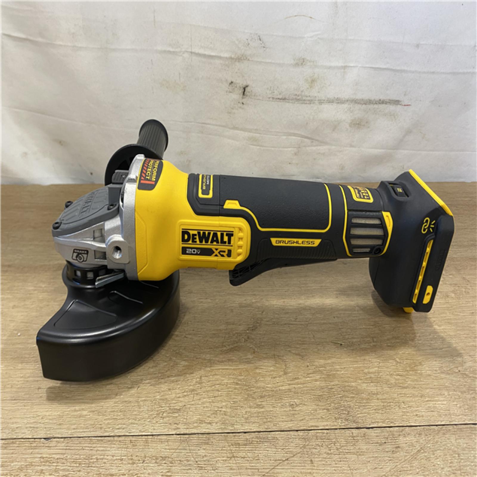 AS-IS DEWALT 20V XR Cordless 4-1/2. in. to 5 in. Variable Speed Angle Grinder (Tool Only)