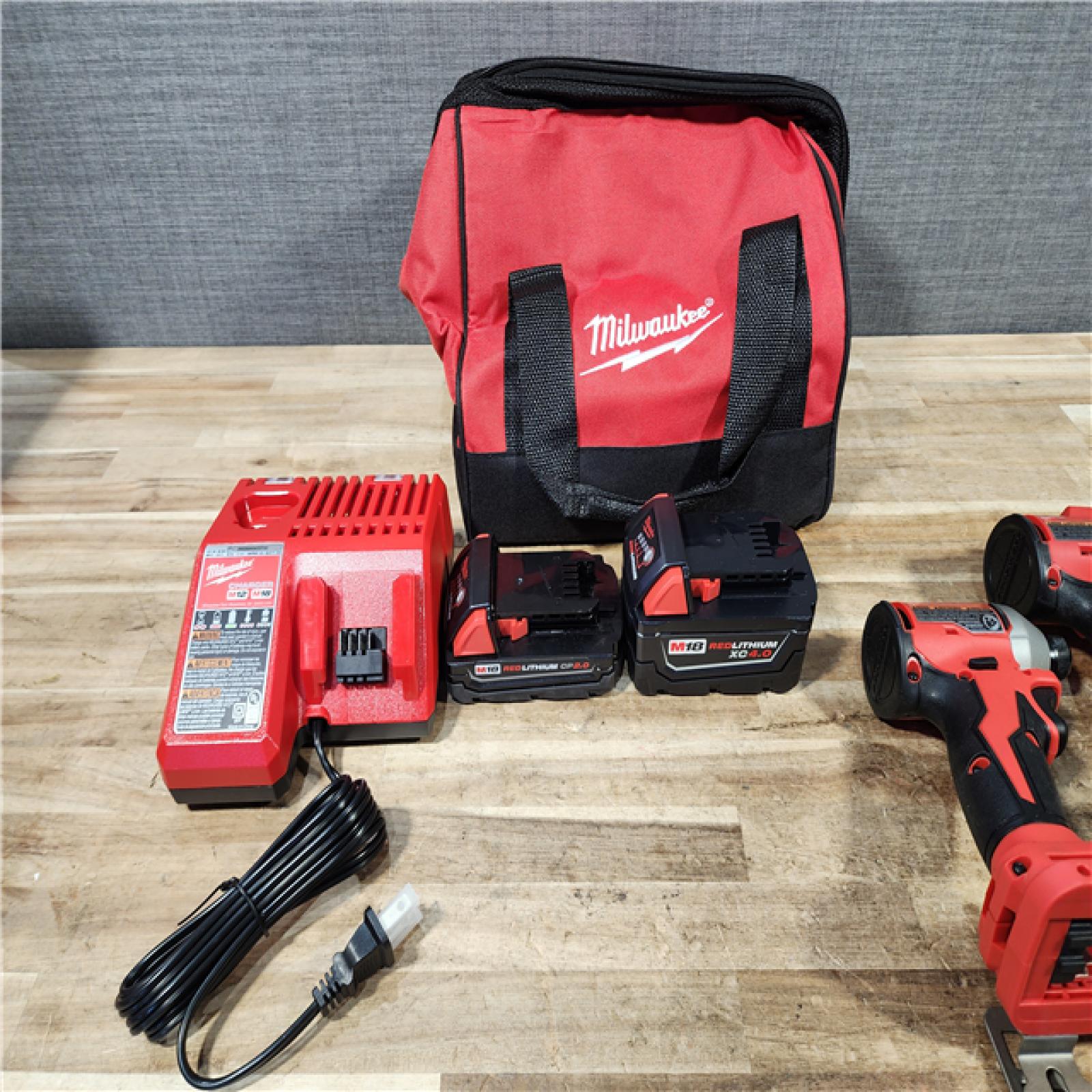 HOUSTON LOCATION - AS - IS Milwaukee 18-Volt Lithium-Ion Brushless Cordless Compact Hammer Drill/Impact Combo Kit