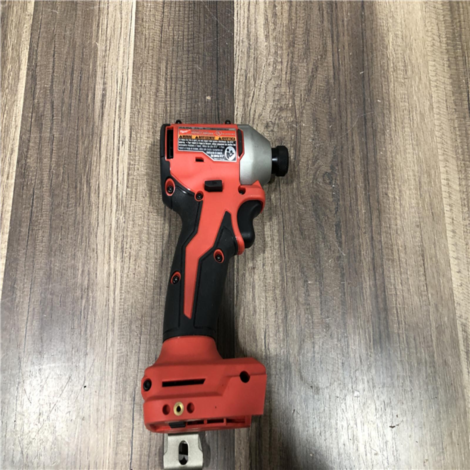 AS-IS Milwaukee 18V Lithium-Ion Brushless Cordless 1/4 in. Compact Impact Driver (Tool Only)